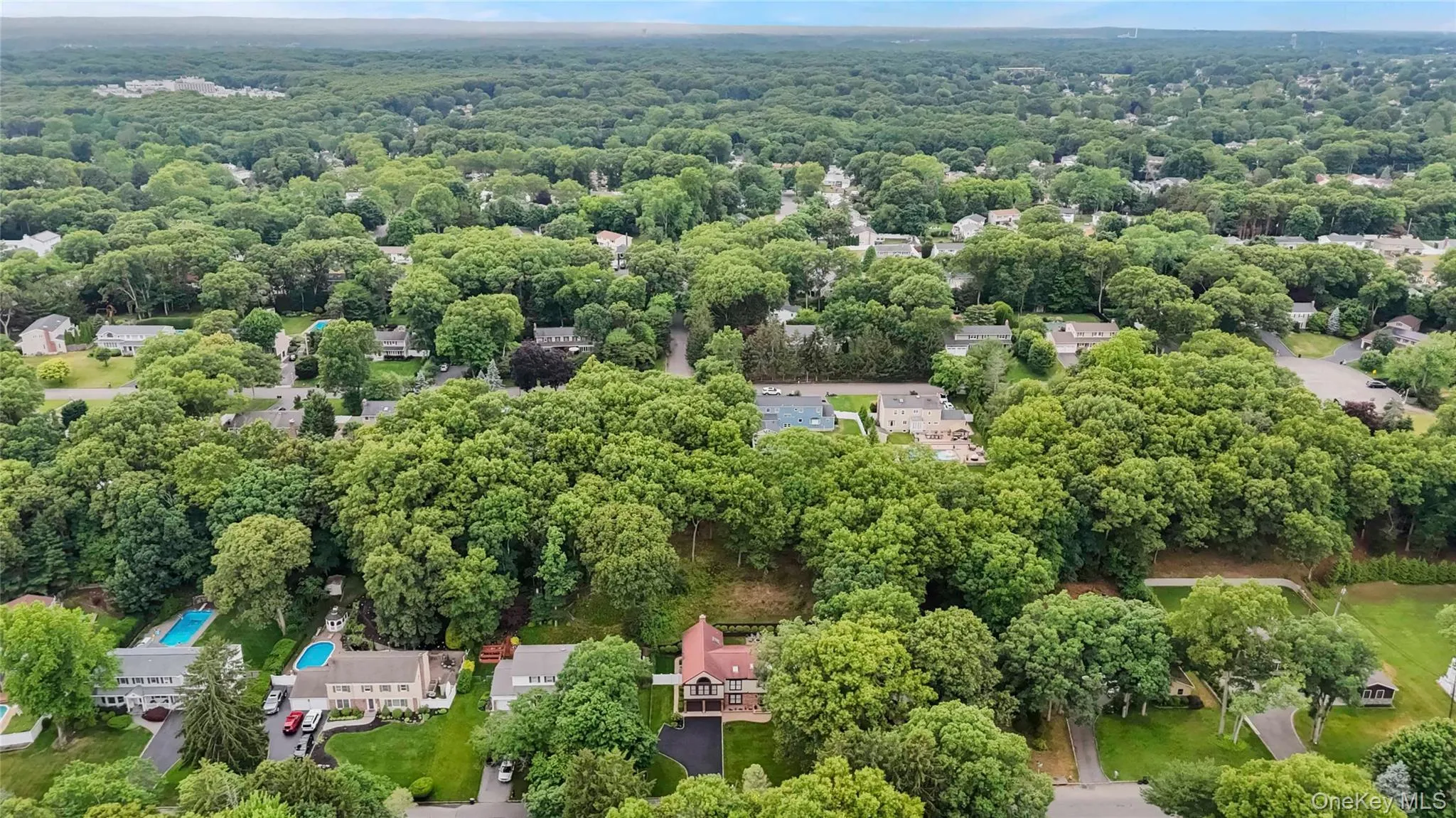 Expansive residential area with dense tree coverage Expansive residential area with dense tree coverage