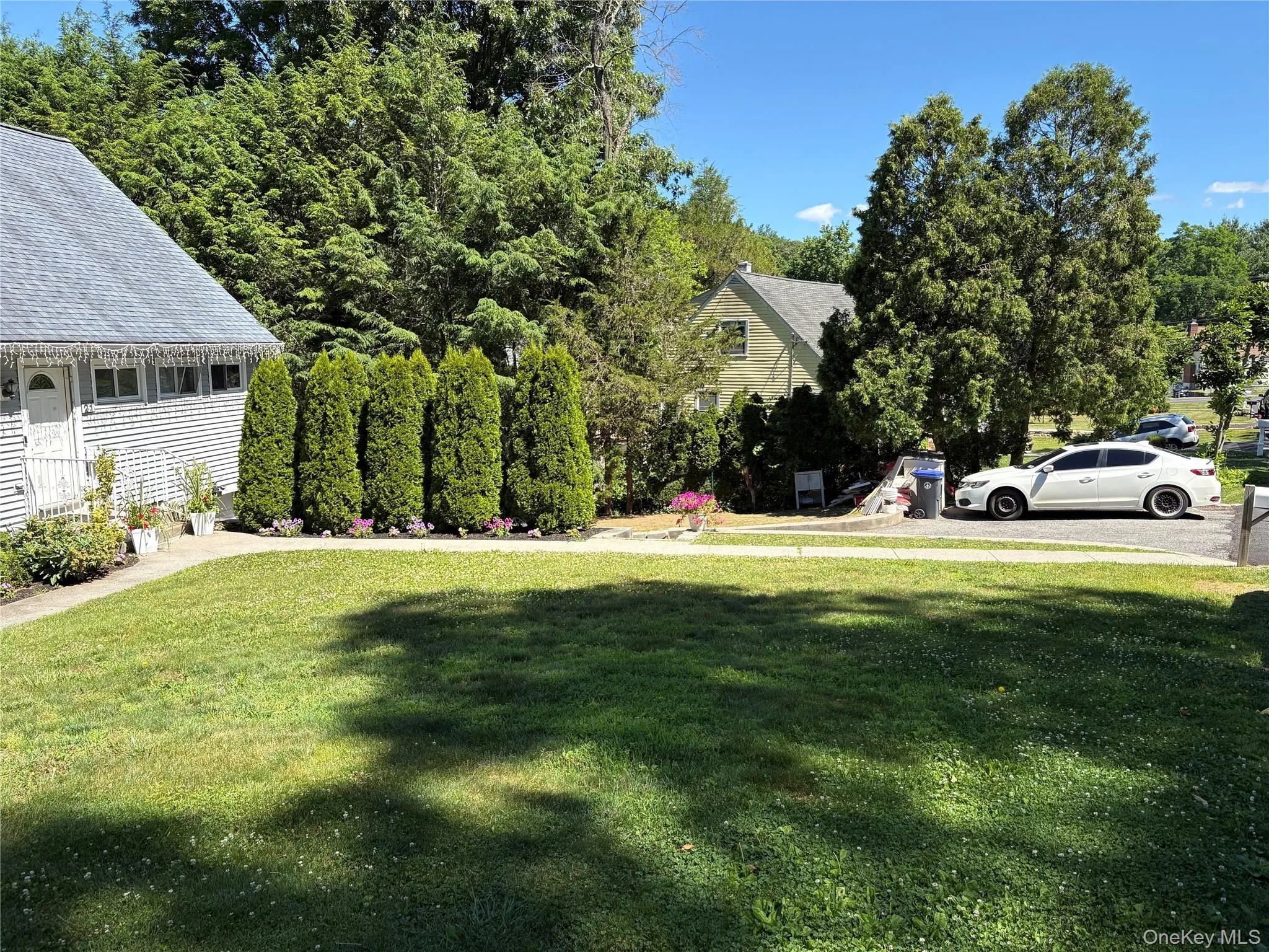 BEAUTIFULLY LANDSCAPED AND MORE PARKING ON THE CAR PORT AFTER DRIVEWAY BEAUTIFULLY LANDSCAPED AND MORE PARKING ON THE CAR PORT AFTER DRIVEWAY