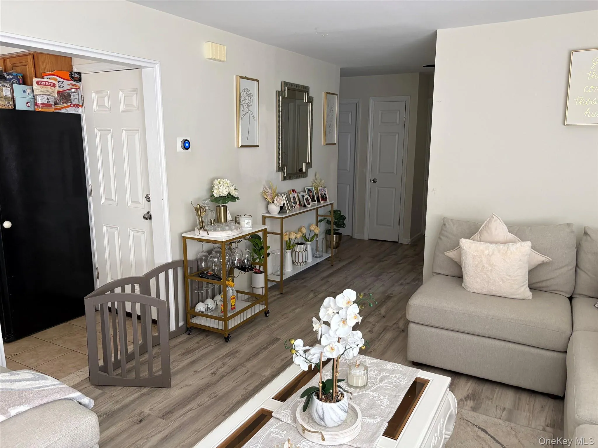 LIVING ROOM LOOKING TOWARDS KITHCEN, FOYER, BATH & BEDROOMS LIVING ROOM LOOKING TOWARDS KITHCEN, FOYER, BATH & BEDROOMS