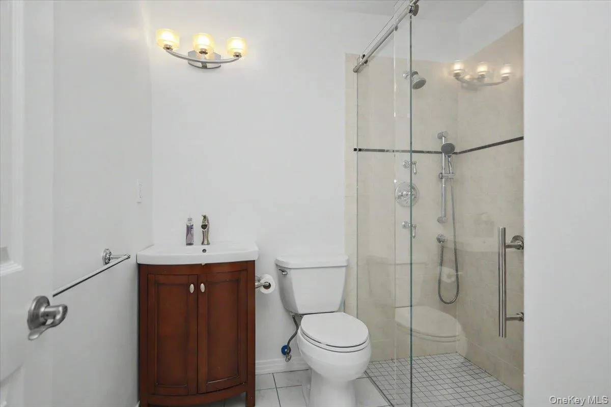 Guest full guest bath on lower level. Guest full guest bath on lower level.
