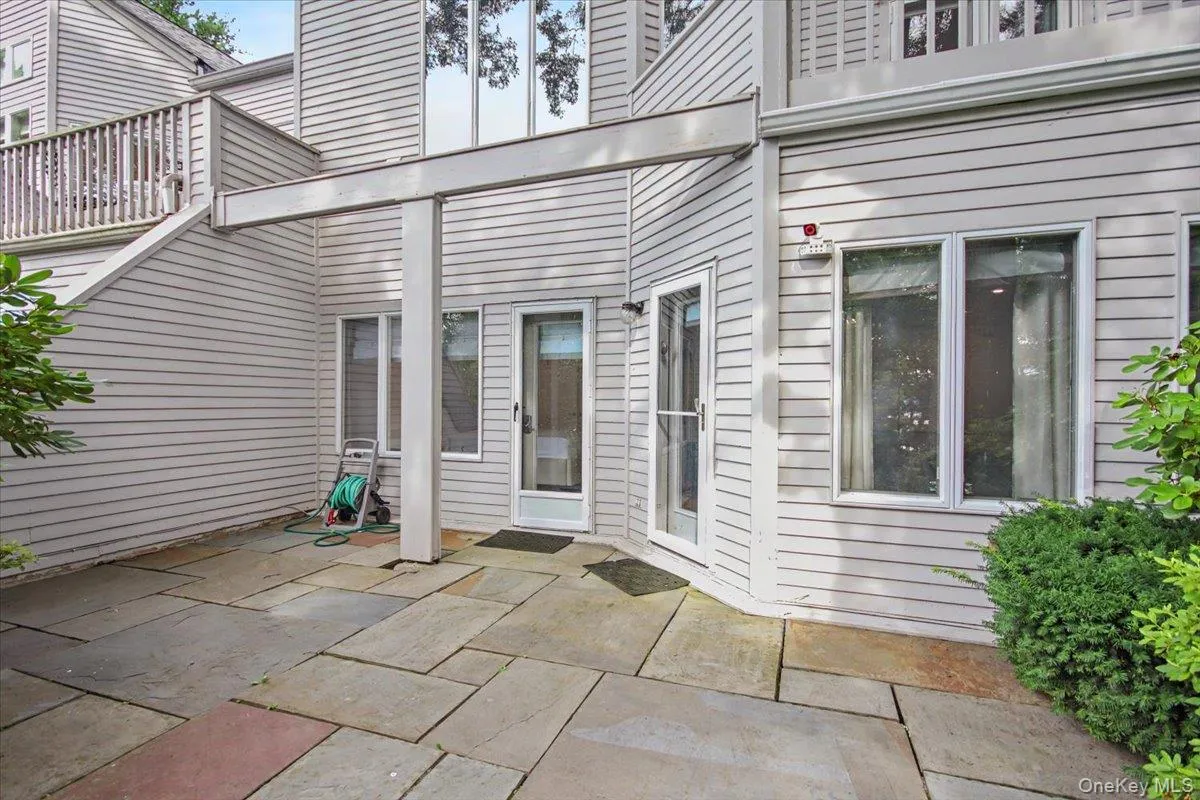 Primary and guest bedrooms lead to private stone patio. Primary and guest bedrooms lead to private stone patio.