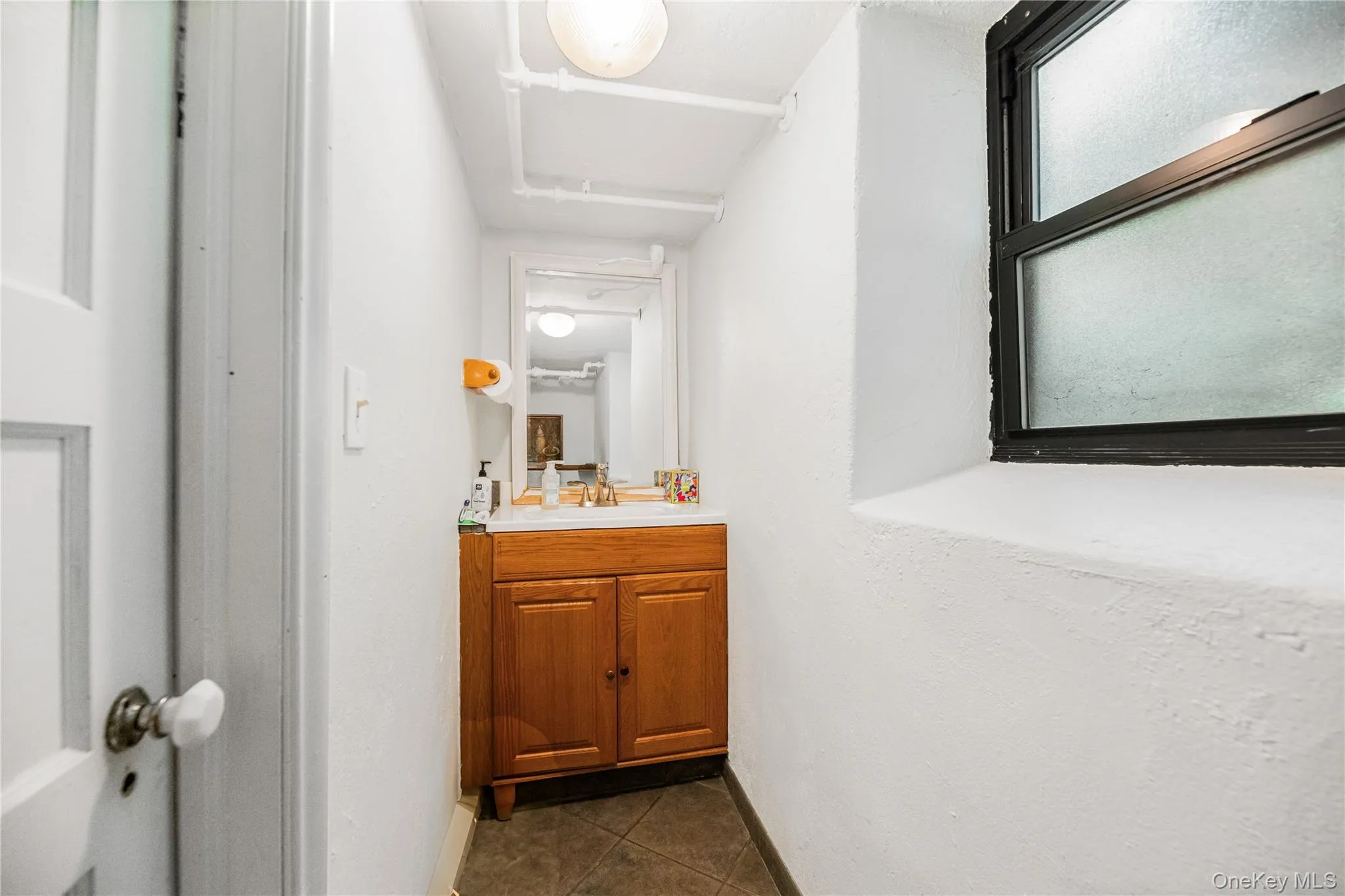 Private Office Half BathConvenient half bath serving the private office suite and reception area. Private Office Half BathConvenient half bath serving the private office suite and reception area.