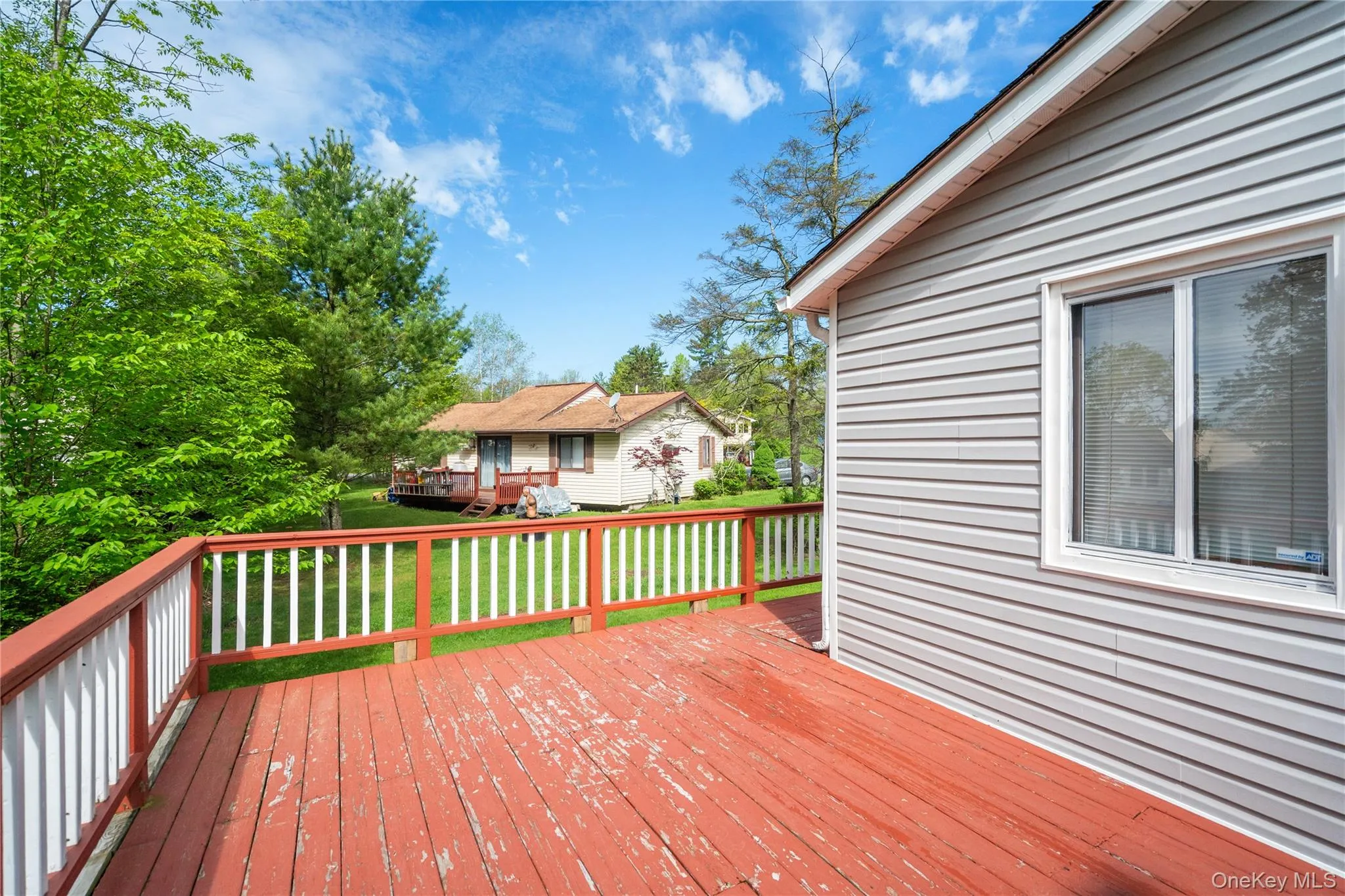 Wooden terrace with a lawn Wooden terrace with a lawn