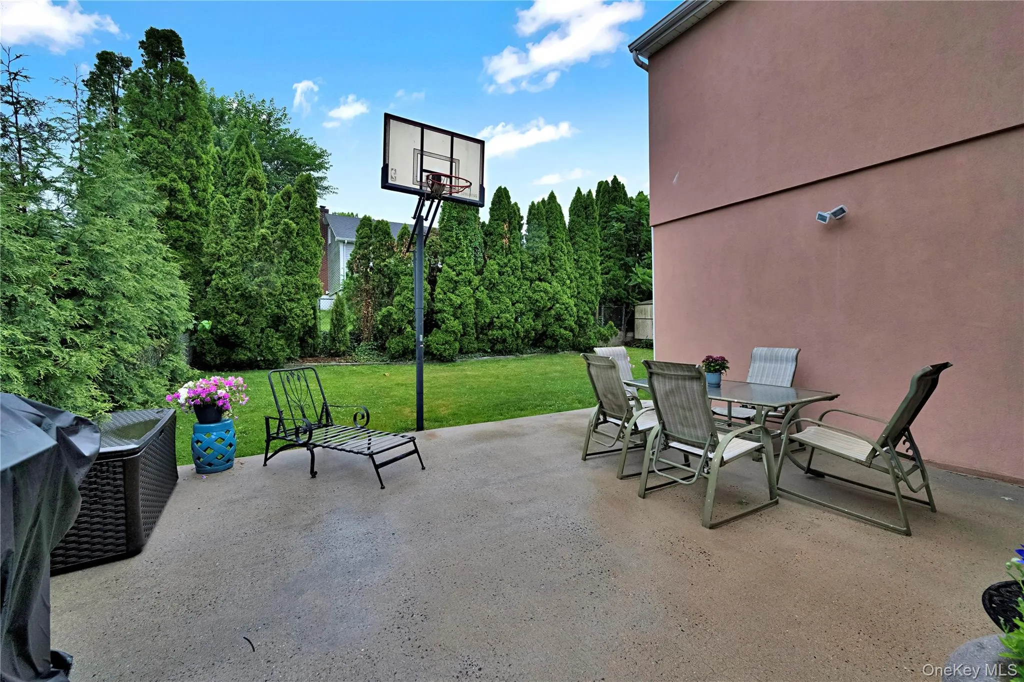 Patio with built in basketball hoop. Patio with built in basketball hoop.