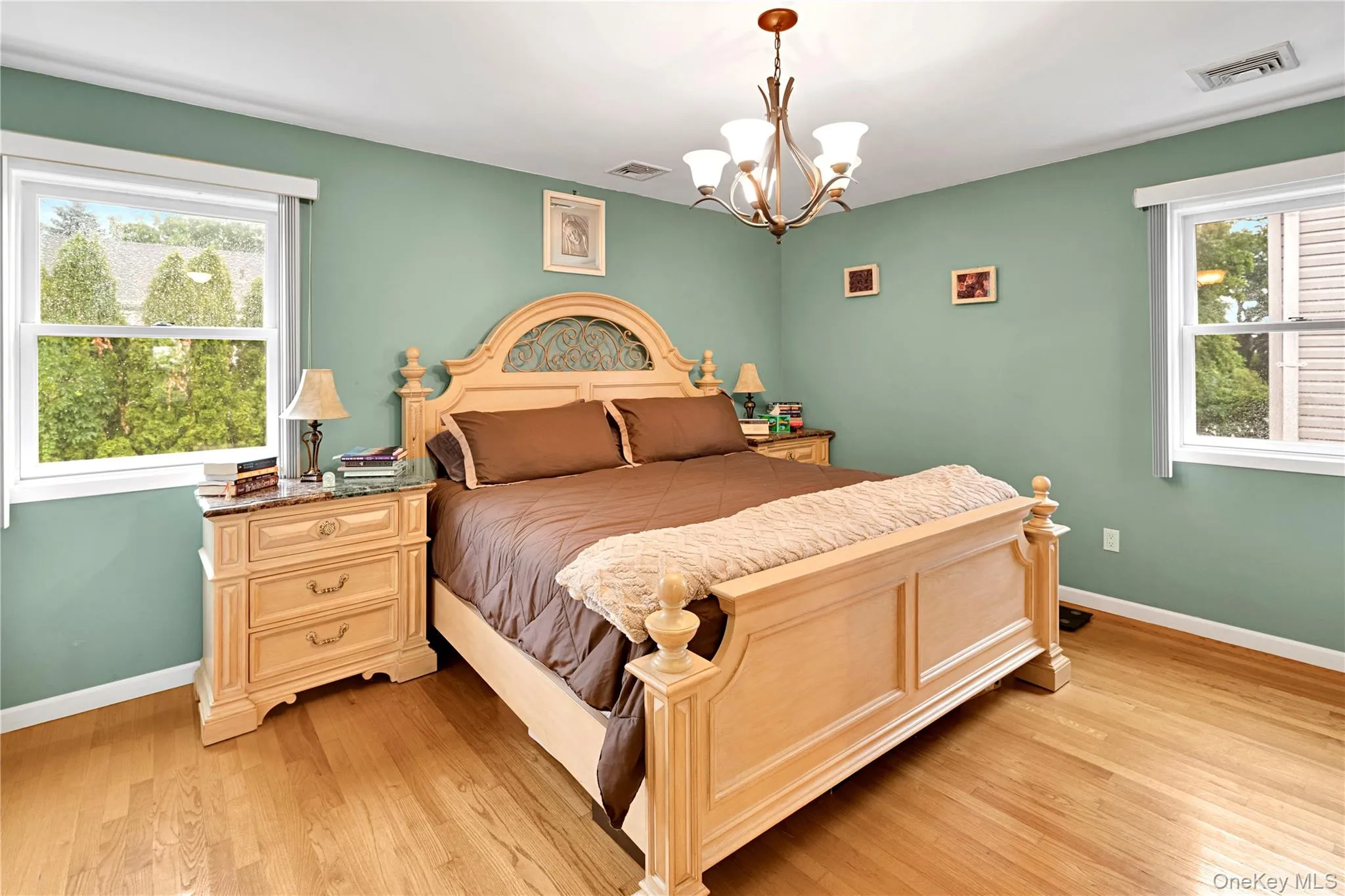 Primary bedroom suite includes a full, updated bathroom. Primary bedroom suite includes a full, updated bathroom.