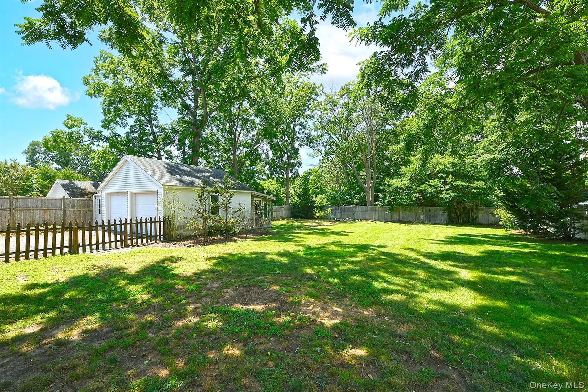 View from the back of the house into this beautiful yard. Over one third of an acre of property. View from the back of the house into this beautiful yard. Over one third of an acre of property.