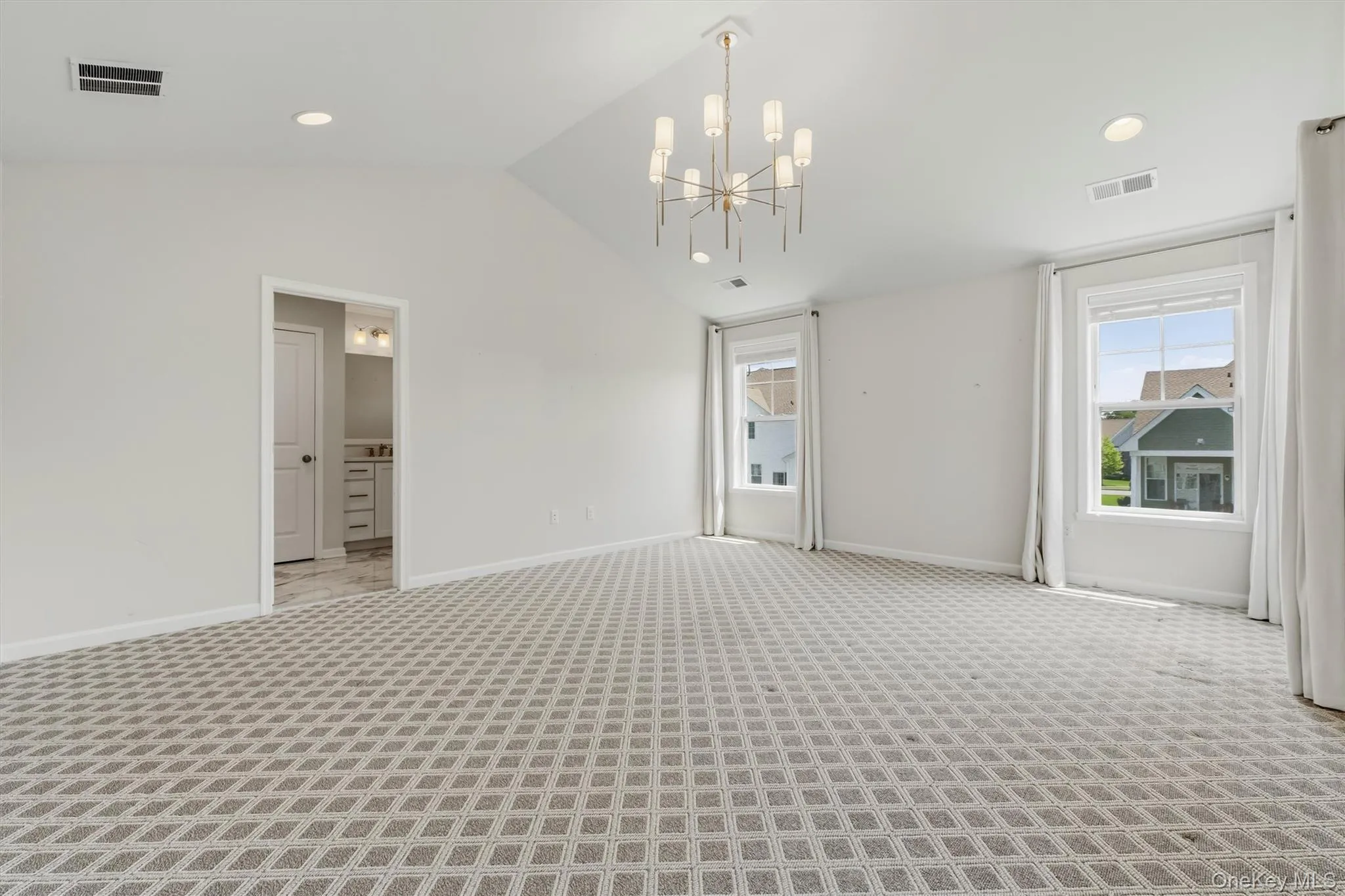 Master bedroom with ensuite bathroom and walk-in closet. Master bedroom with ensuite bathroom and walk-in closet.