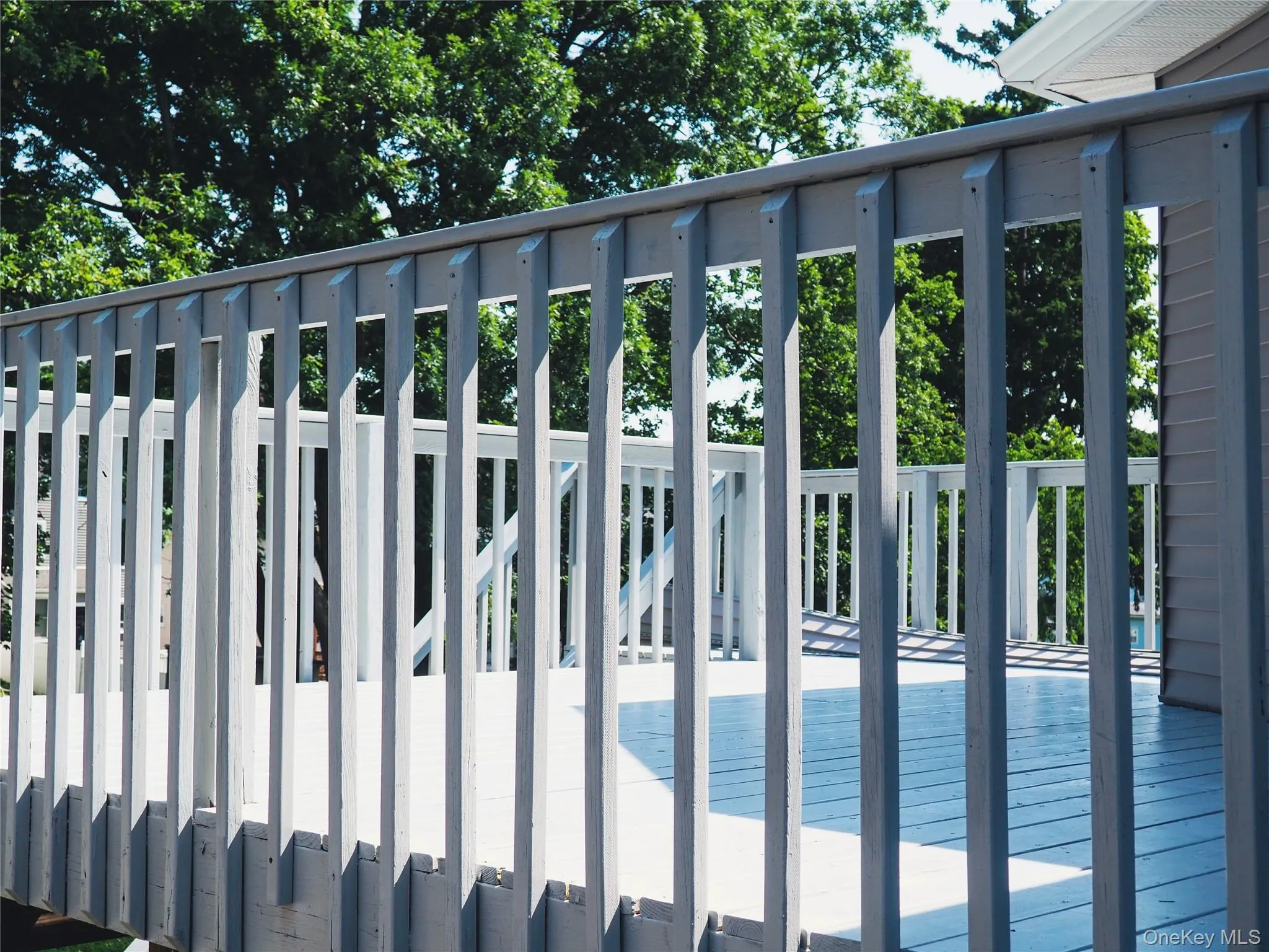 You"ll enjoy the extra living space on this rear deck. You"ll enjoy the extra living space on this rear deck.