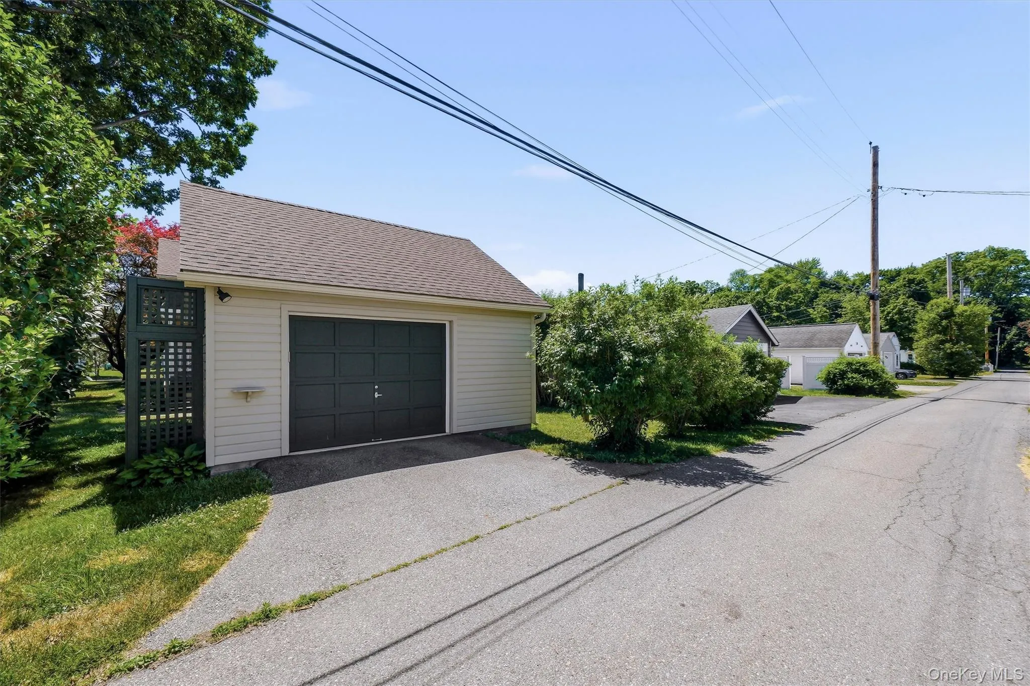1 car garage with lots of storageand rear access road 1 car garage with lots of storageand rear access road