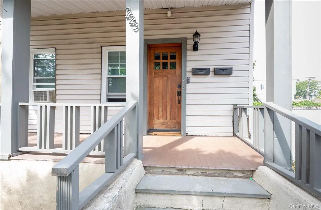 A covered porch perfect for sipping lemonade. A covered porch perfect for sipping lemonade.