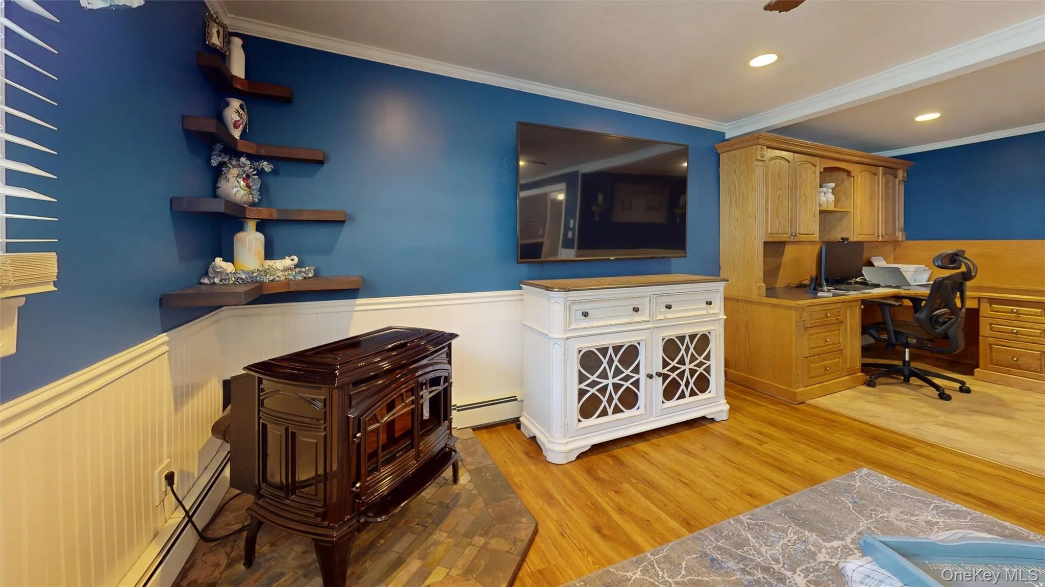 The living room flows into the BONUS room area, ideal as an office or for overflow family use. The living room flows into the BONUS room area, ideal as an office or for overflow family use.