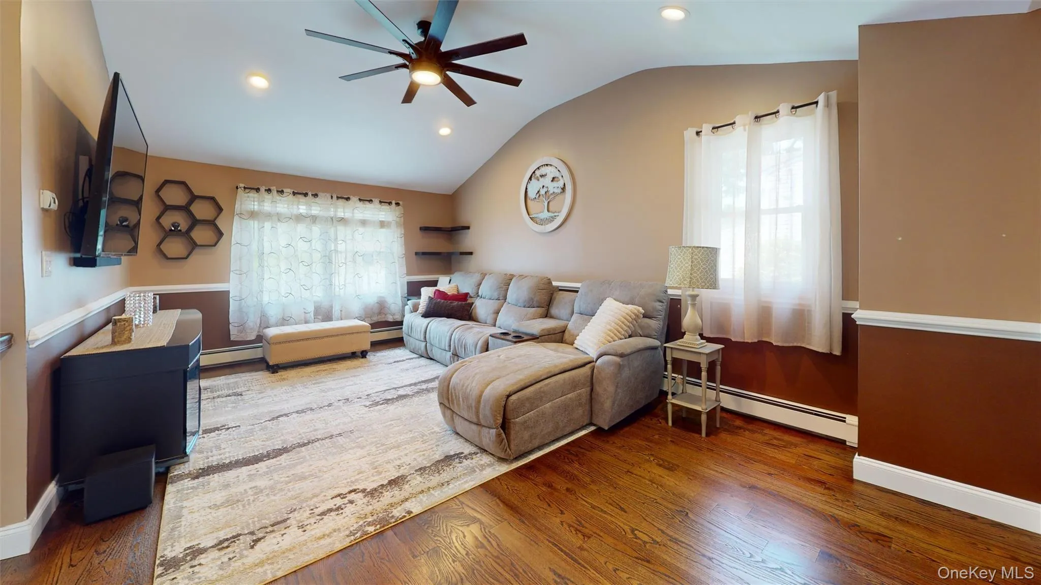 This spacious family room features another great open floor plan area. This spacious family room features another great open floor plan area.
