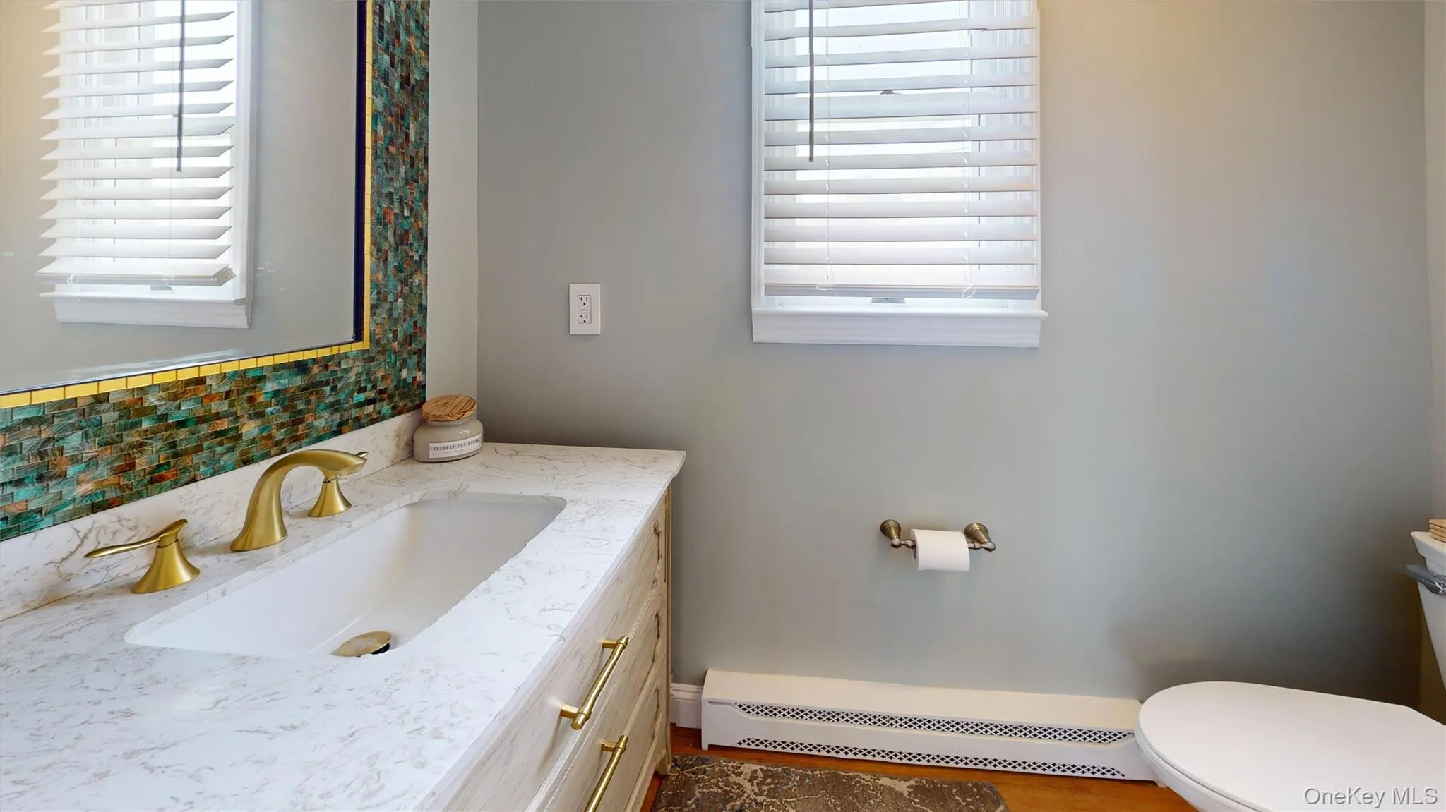 A spotless and spacious half bath! A spotless and spacious half bath!