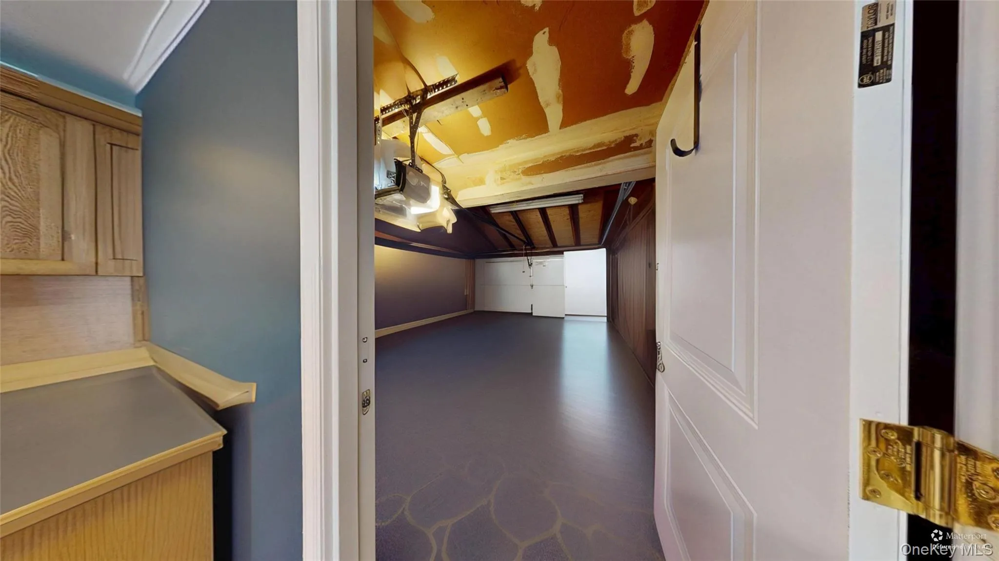 (DE furnished photo)The Bonus room door leads to an abbreviated garage with an electric door opener! (DE furnished photo)The Bonus room door leads to an abbreviated garage with an electric door opener!