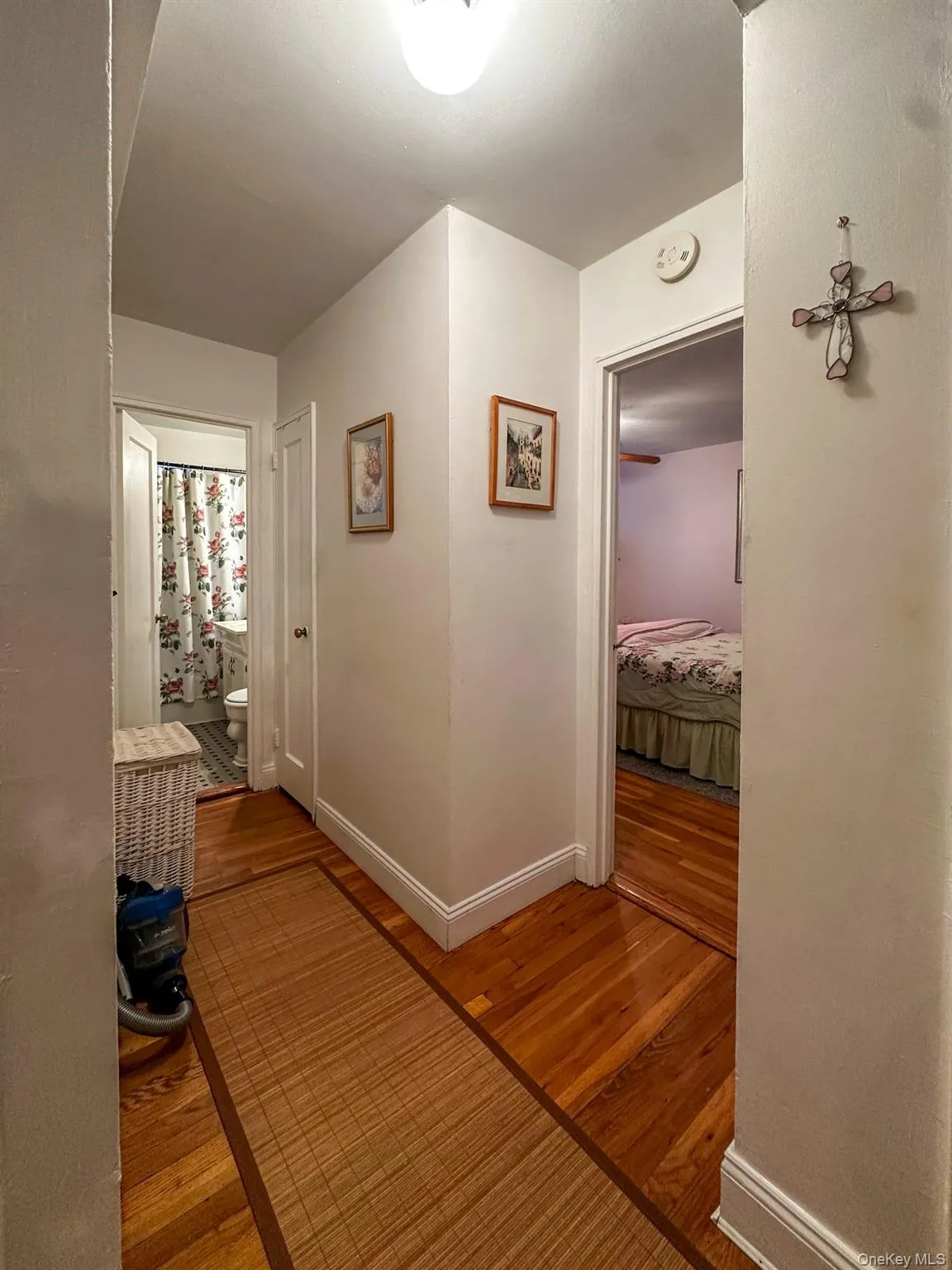 Hardwood flooring throughout hallway. Hardwood flooring throughout hallway.
