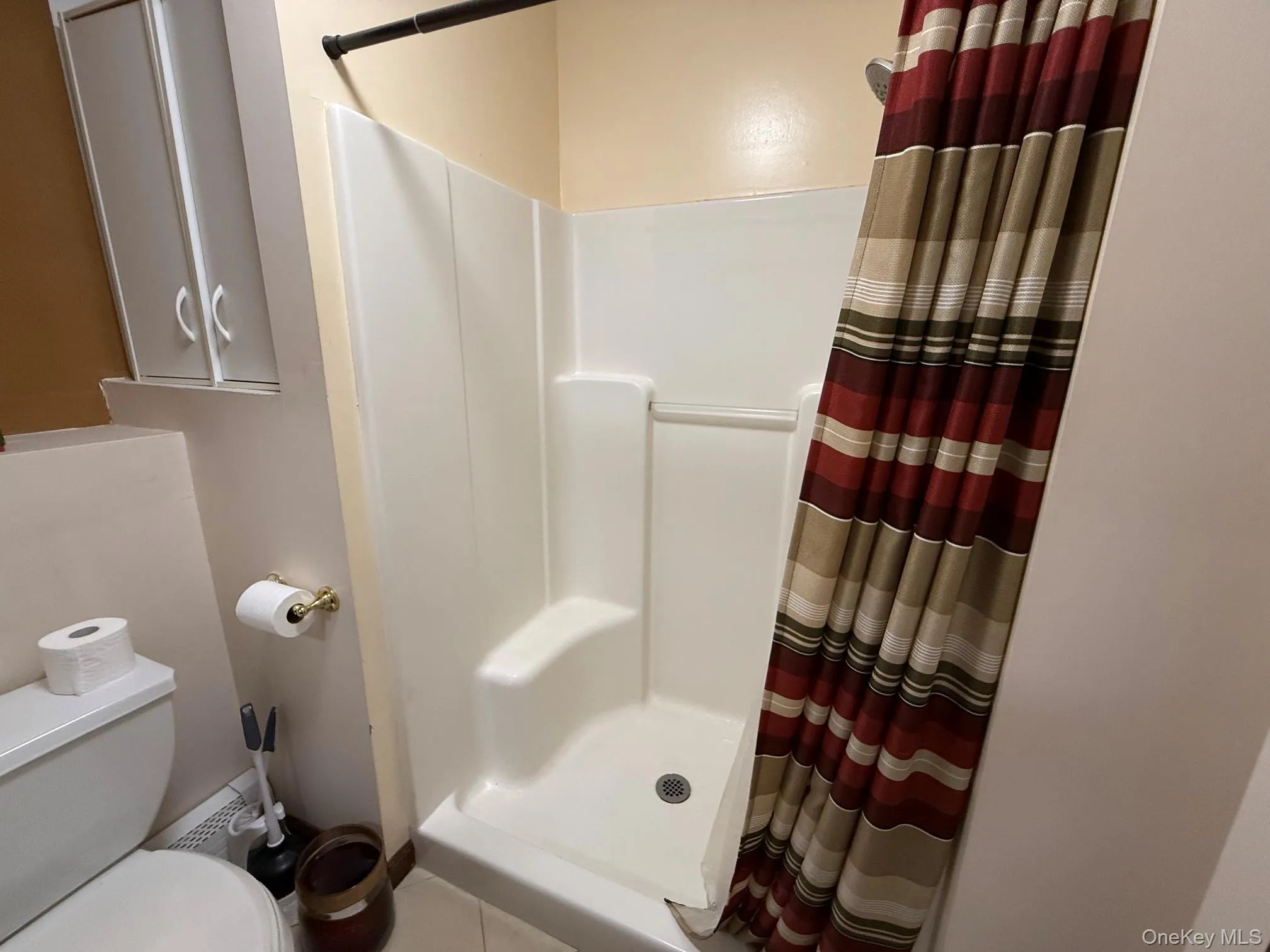 another angle of full bathroom on lower level another angle of full bathroom on lower level