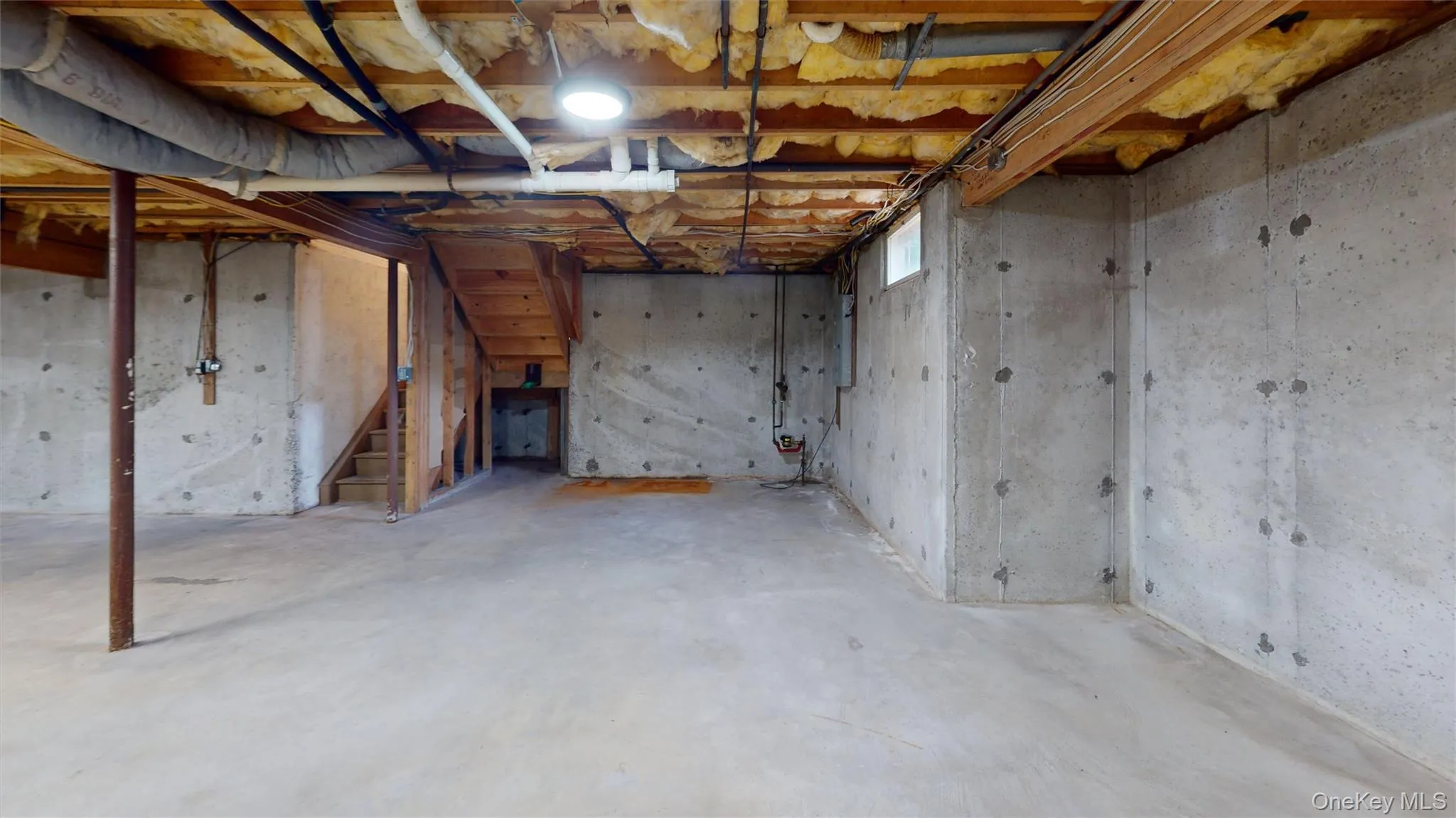 The full basement, under most of the house, is large and features a poured concrete foundation. The full basement, under most of the house, is large and features a poured concrete foundation.