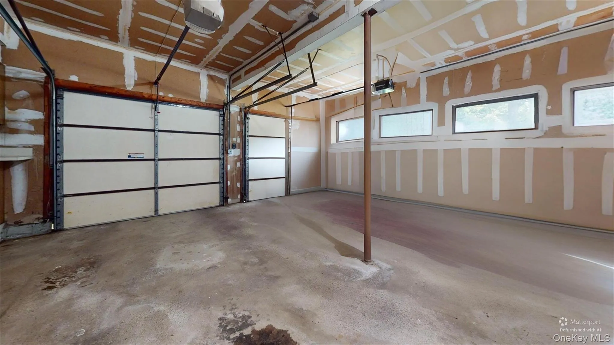 OVERSIZED 2.5-car garage with electric garage door openers, featuring a side-entry look and additional storage space! OVERSIZED 2.5-car garage with electric garage door openers, featuring a side-entry look and additional storage space!