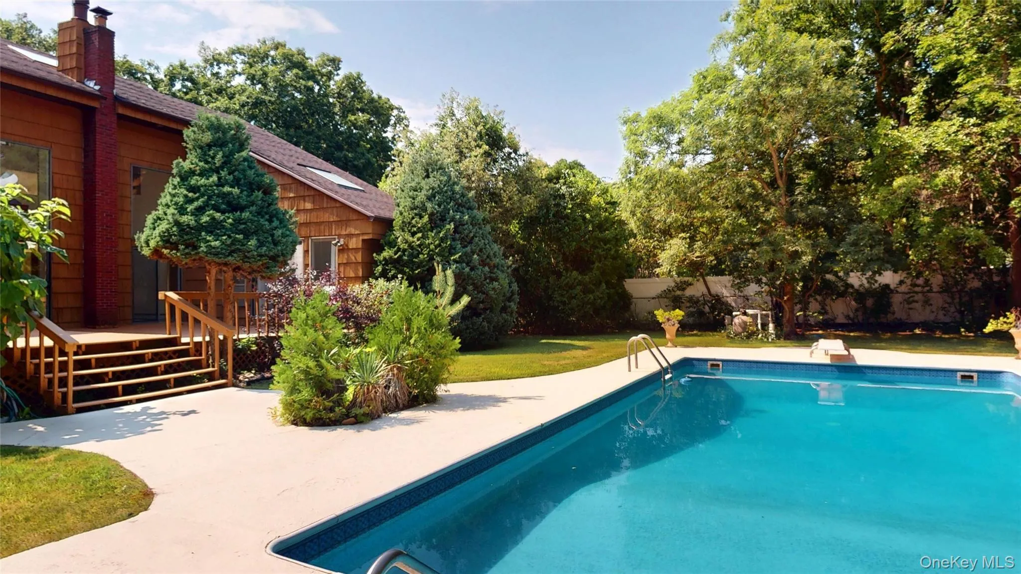 A parklike setting surrounds the backyard, which features an in-ground, vinyl-lined pool. (The liner is 5 years old) A parklike setting surrounds the backyard, which features an in-ground, vinyl-lined pool. (The liner is 5 years old)