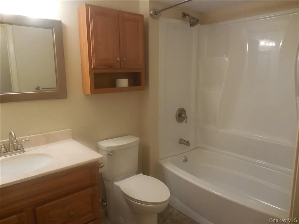 With a tub. With a tub.