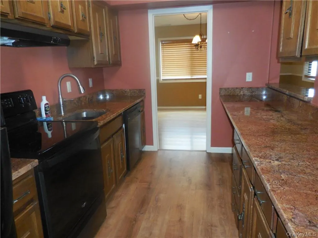 With granite counter tops. With granite counter tops.