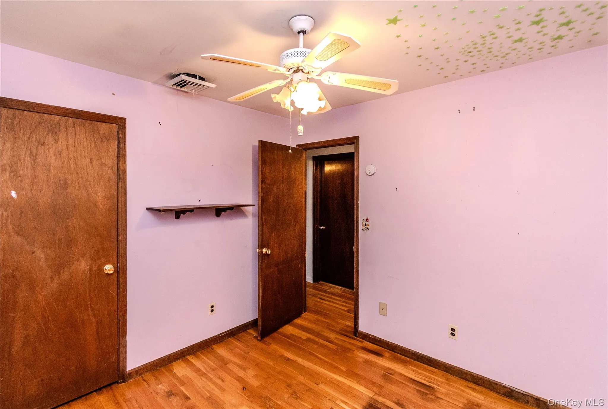Bedroom - Upstairs. Door to hallway and closet Bedroom - Upstairs. Door to hallway and closet
