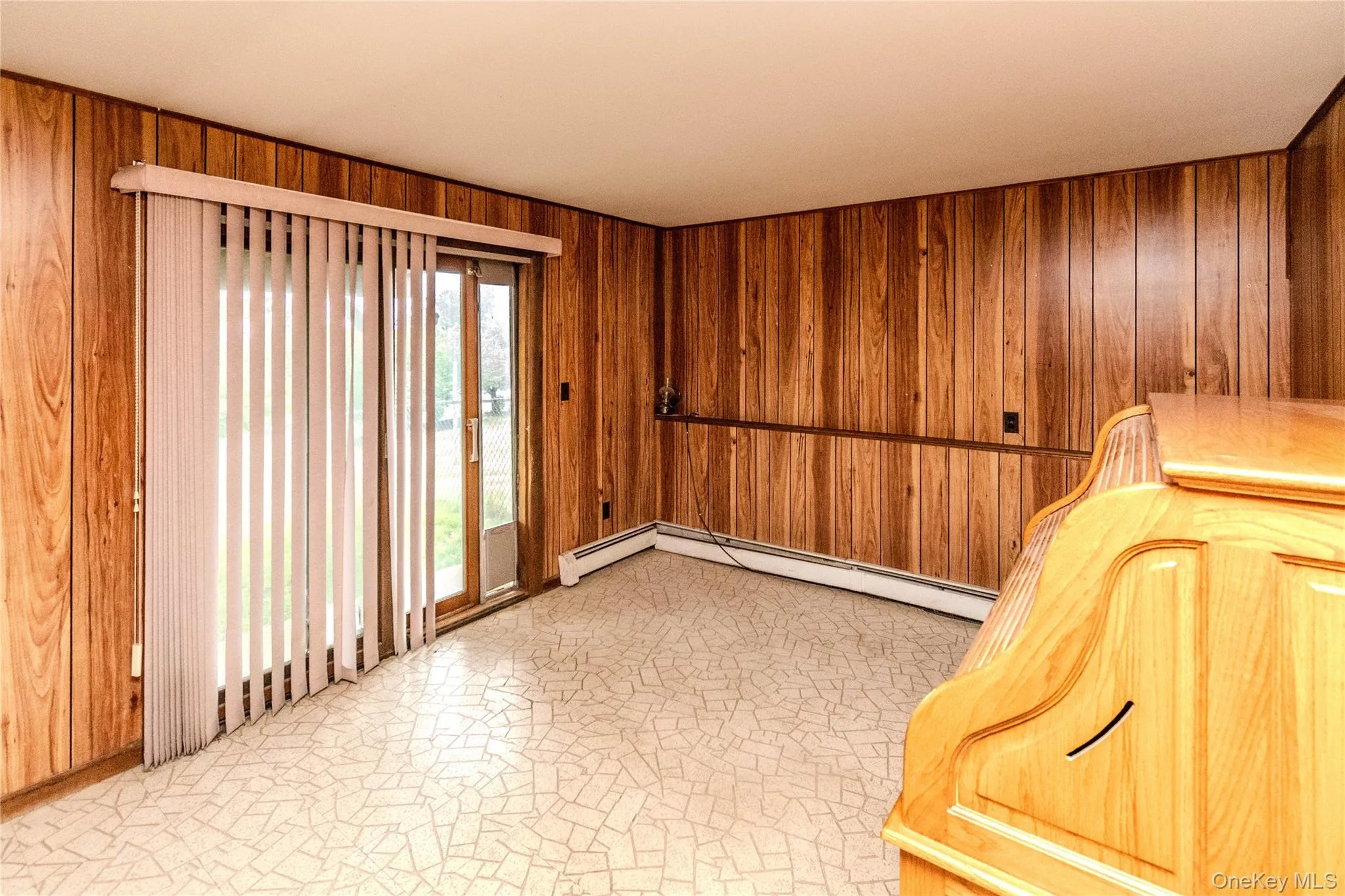 Lower level living area - exterior exit to backyard Lower level living area - exterior exit to backyard