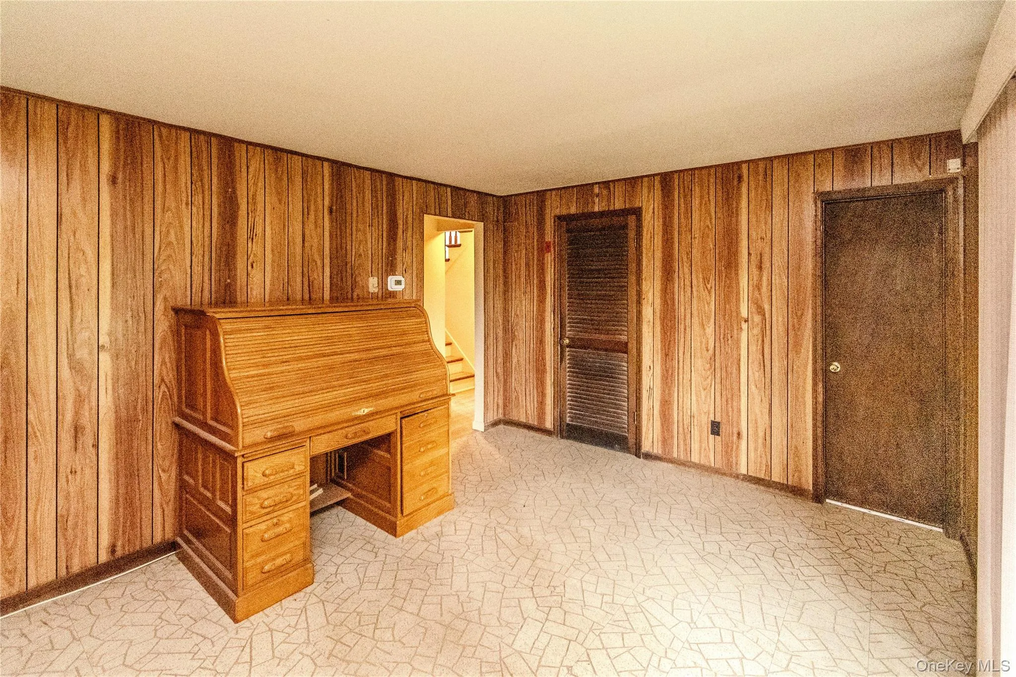Lower level living area - exterior exit to backyard Lower level living area - exterior exit to backyard