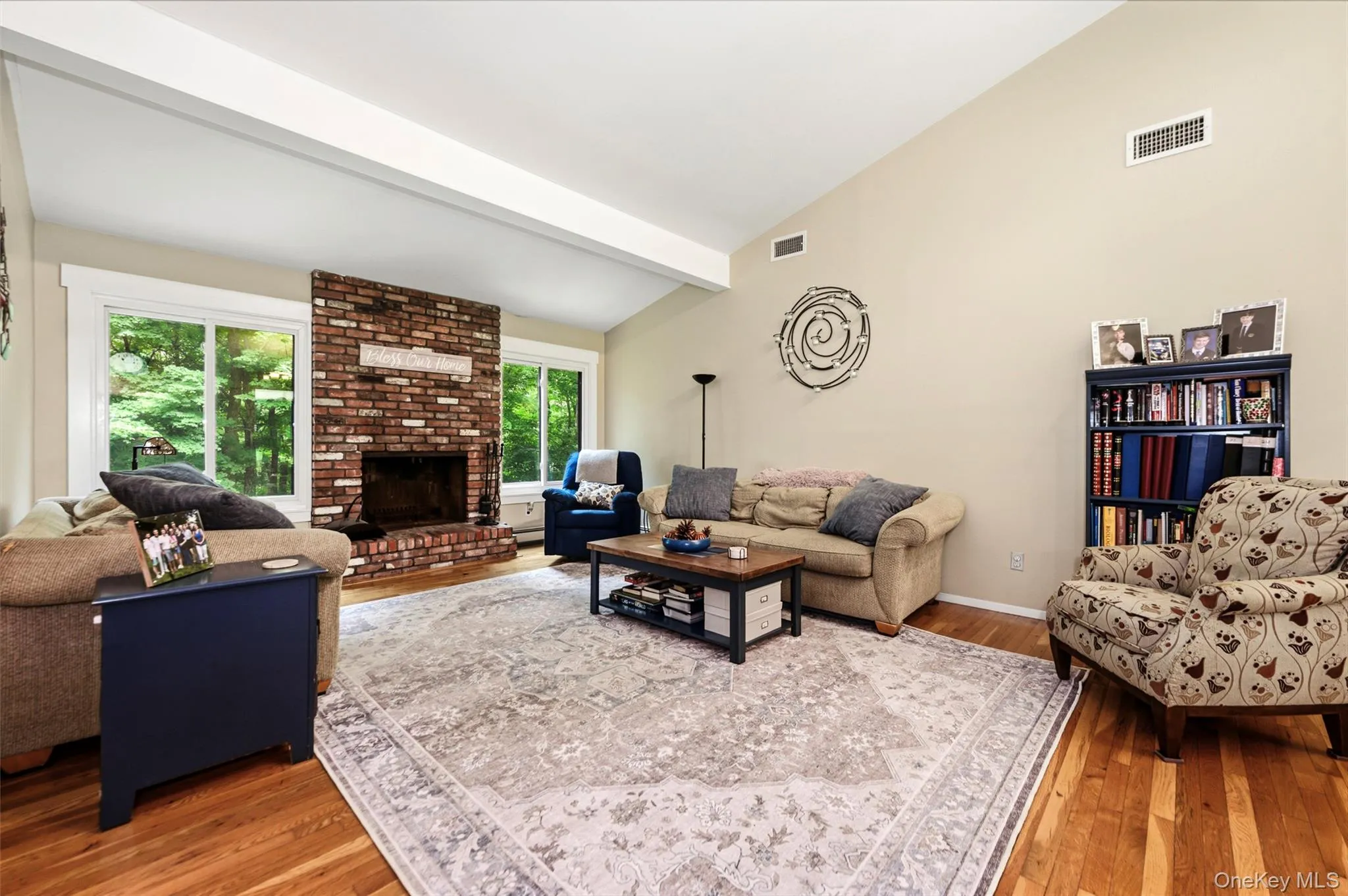 Living room with wood-burning fireplace. Living room with wood-burning fireplace.