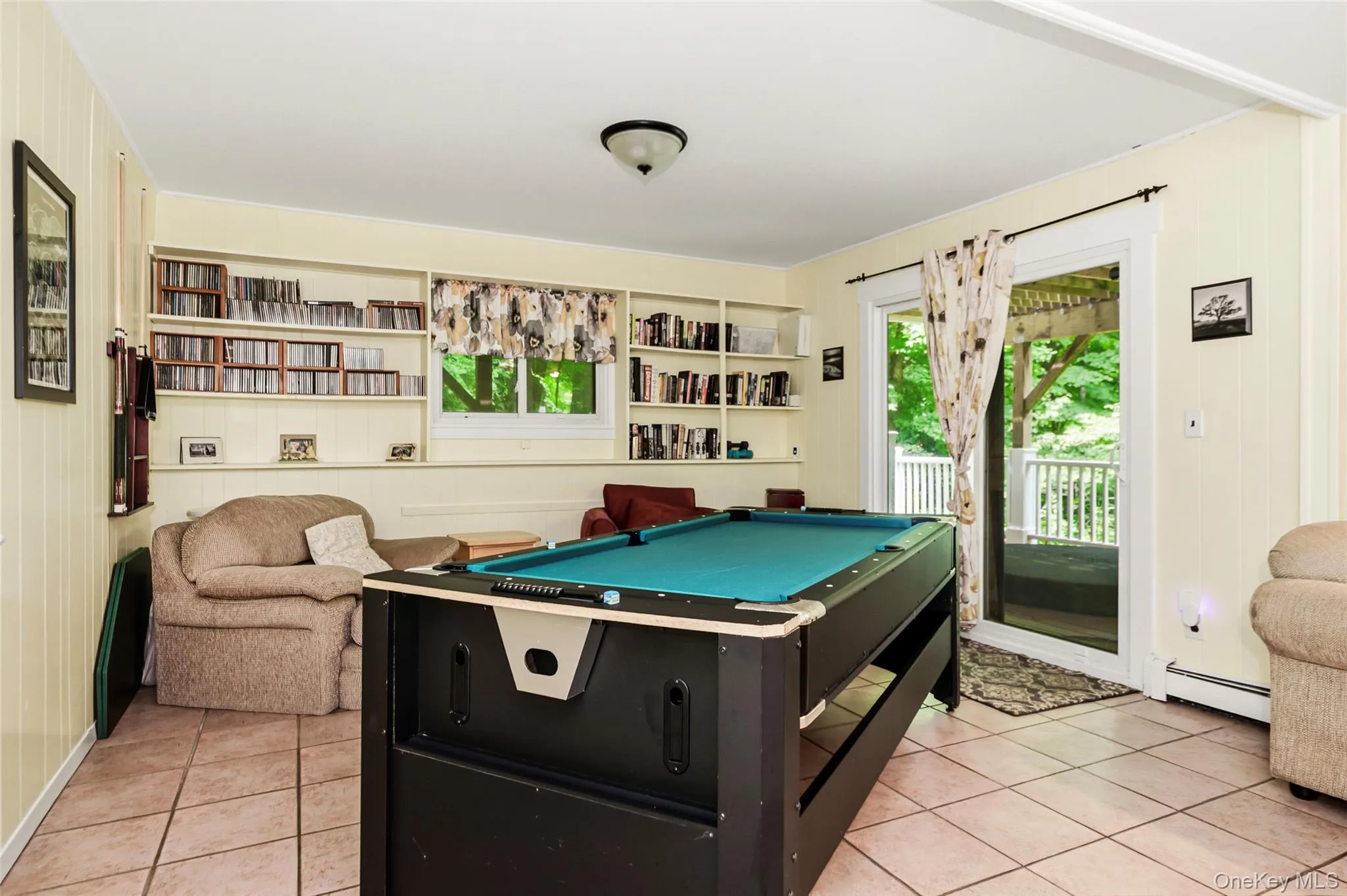 Lower-level walk-out family room. Lower-level walk-out family room.