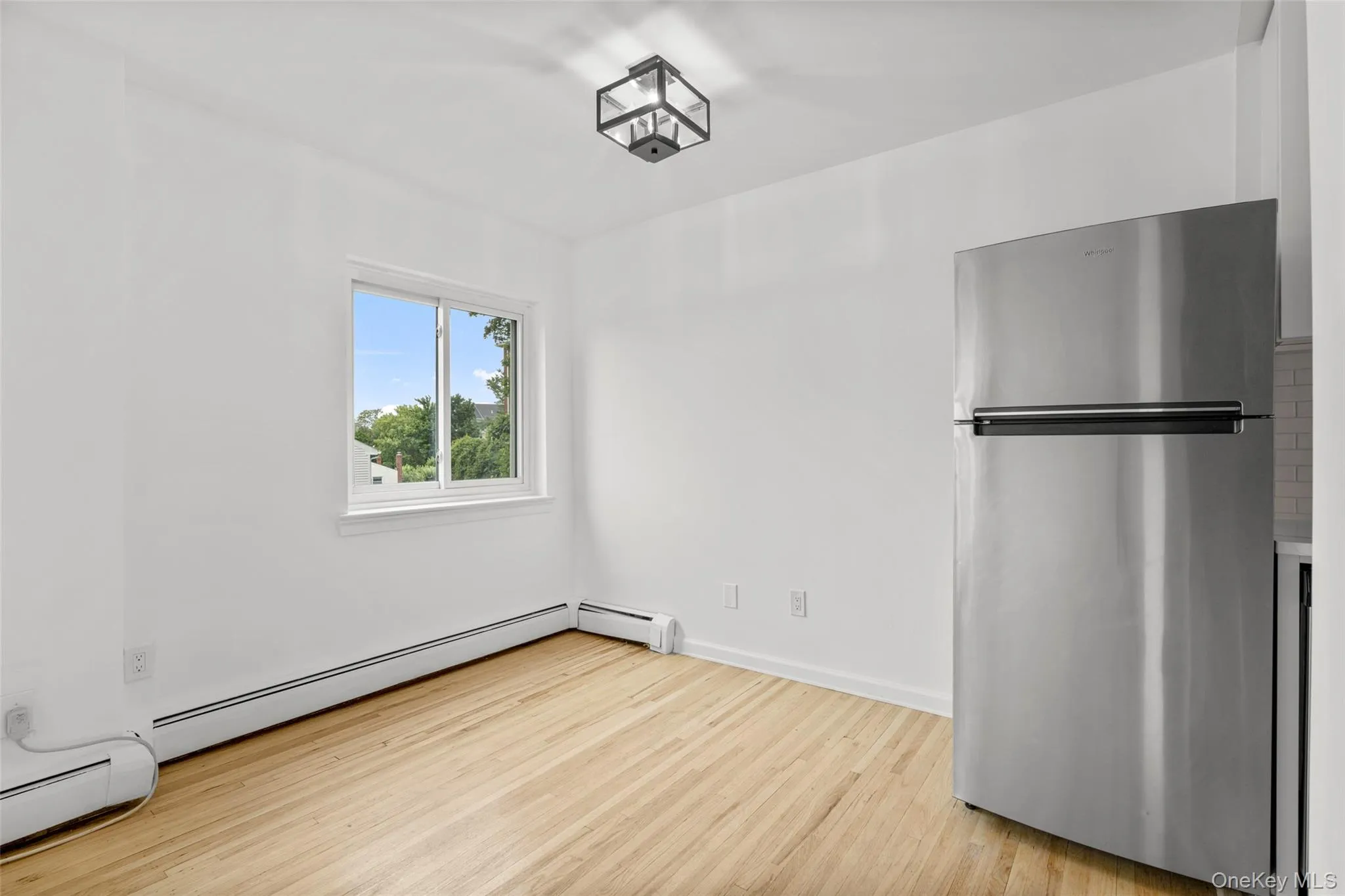 Dining area with window facing Midland Avenue. Dining area with window facing Midland Avenue.