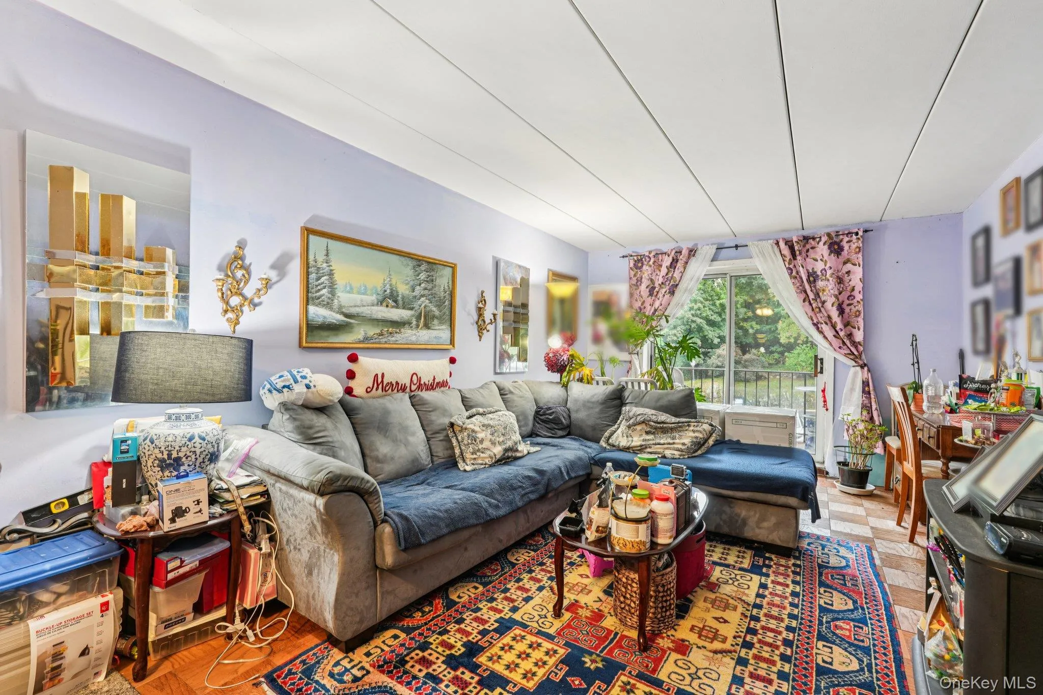 Large living area with sliding glass doors to the private balcony Large living area with sliding glass doors to the private balcony