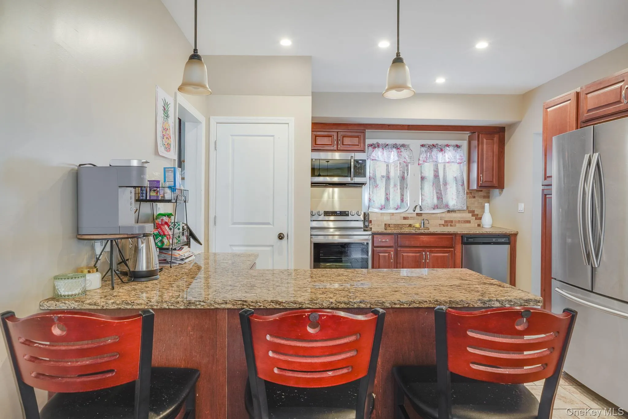 Eat in kitchen with stainless steel appliances. Eat in kitchen with stainless steel appliances.