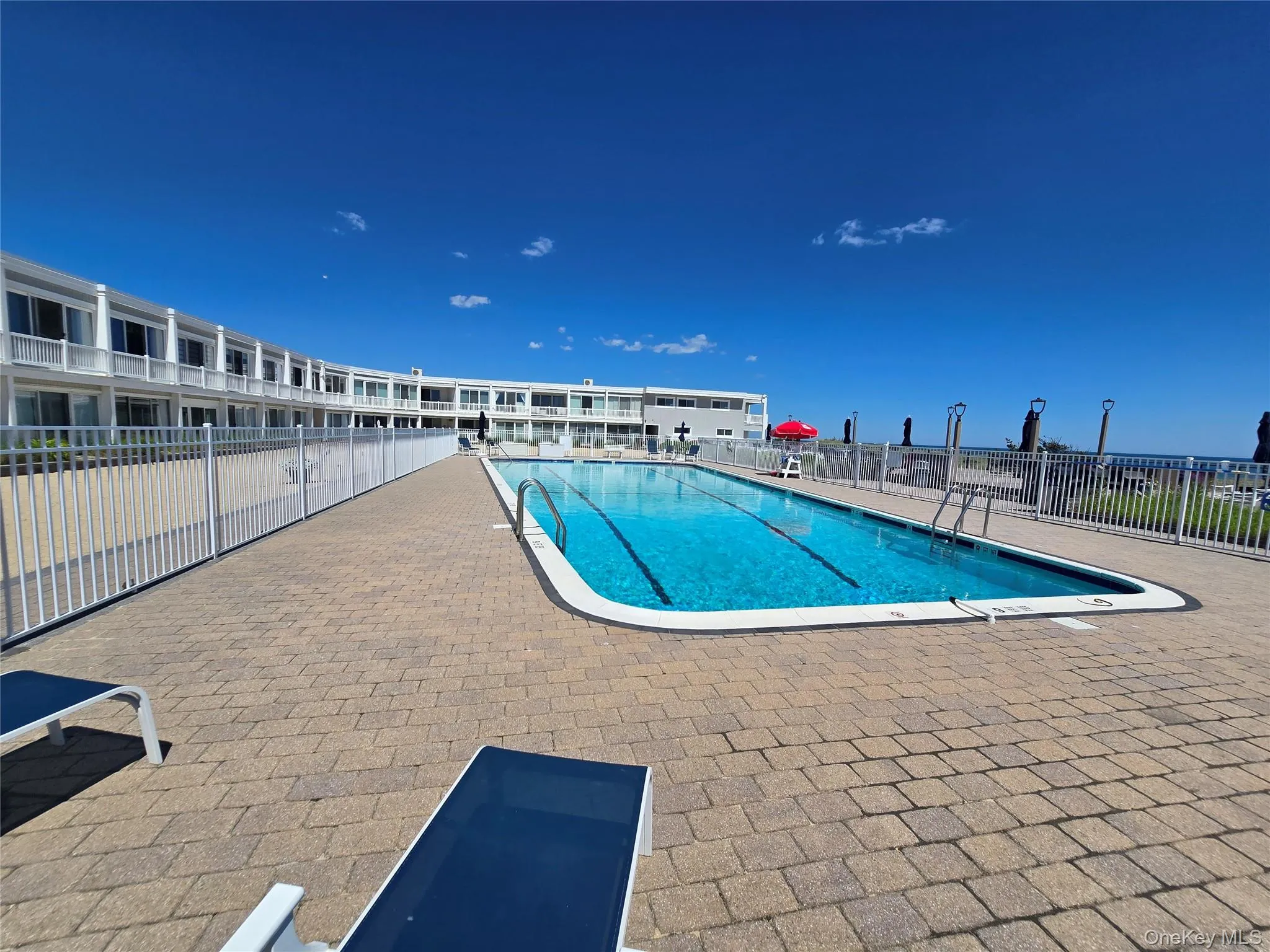 Outdoor swimming pool with integrated lane lines Outdoor swimming pool with integrated lane lines