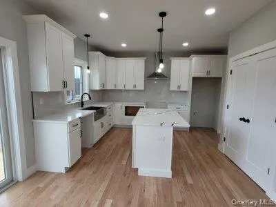Beautifully appointed kitchen showcasing quality cabinetry, quartz countertops, stainless steel appliances, and generous workspace. Beautifully appointed kitchen showcasing quality cabinetry, quartz countertops, stainless steel appliances, and generous workspace.