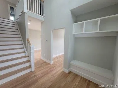 Thoughtfully designed entrance foyer featuring seating and built-in storage to compliment everyday living and entertaining with elegant functionality. Thoughtfully designed entrance foyer featuring seating and built-in storage to compliment everyday living and entertaining with elegant functionality.