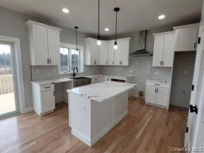 Abundant cabinetry, designer finishes and thoughtful attention to everyday functionality are present throughout this well appointed kitchen. Abundant cabinetry, designer finishes and thoughtful attention to everyday functionality are present throughout this well appointed kitchen.