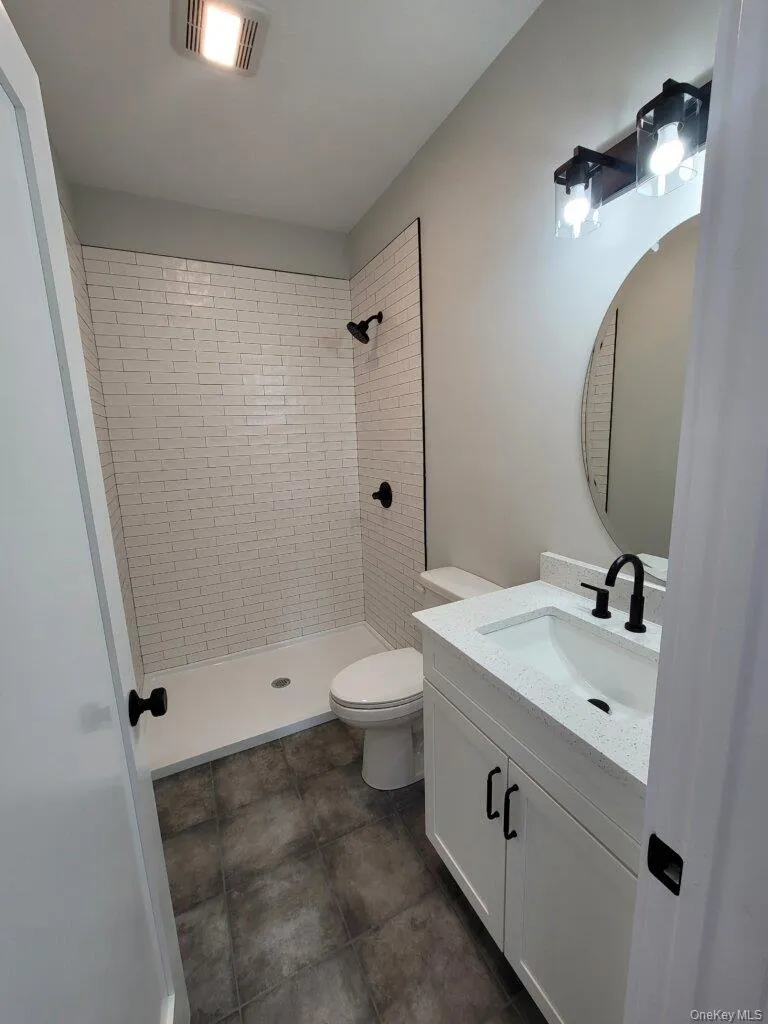 Another view of the bathroom's attractive finishes and efficient layout. Another view of the bathroom's attractive finishes and efficient layout.