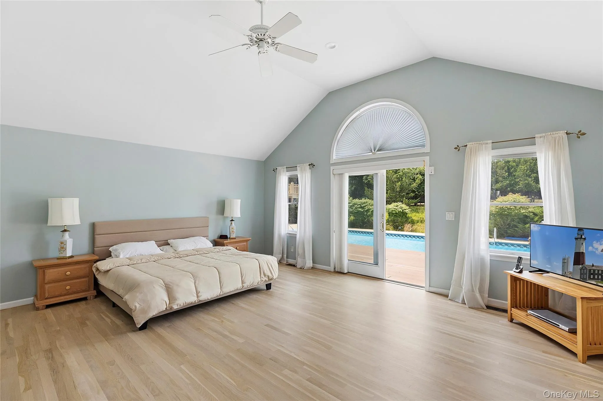 1st floor primary bedroom, pool beyond 1st floor primary bedroom, pool beyond