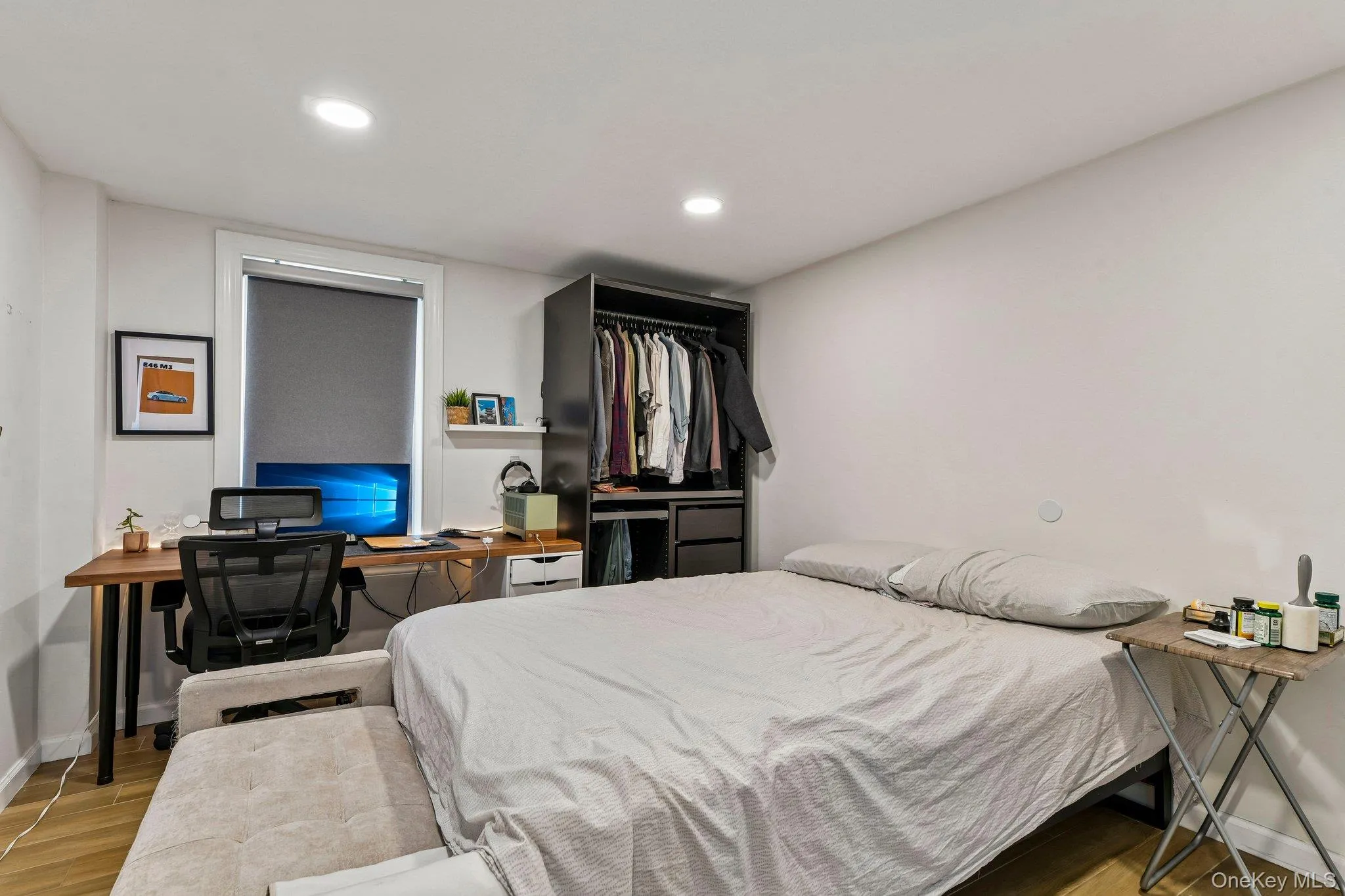 Hardwood-finish flooring complements the neutral wall color Hardwood-finish flooring complements the neutral wall color