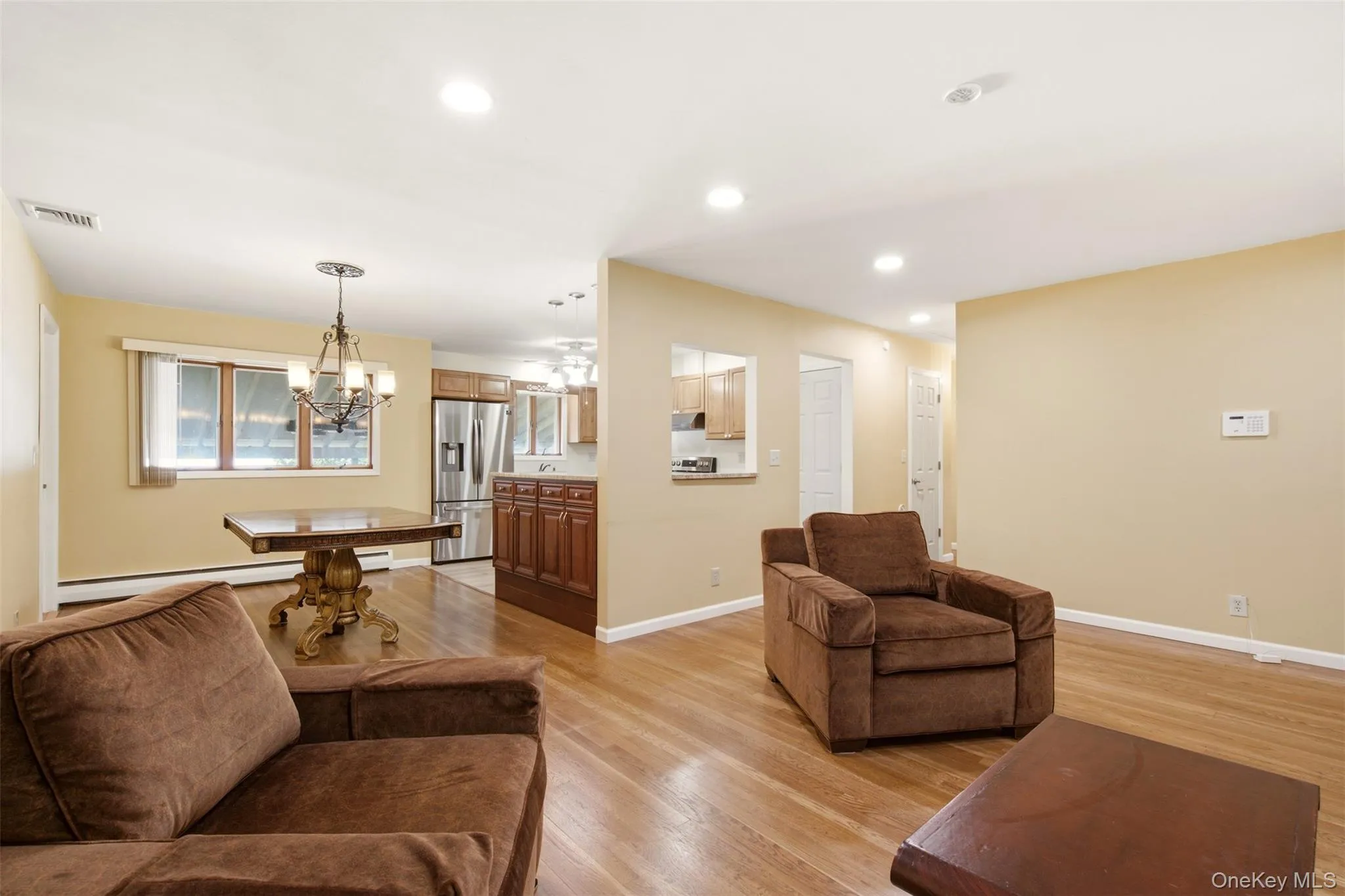 With Gleaming Hardwood Floors With Gleaming Hardwood Floors
