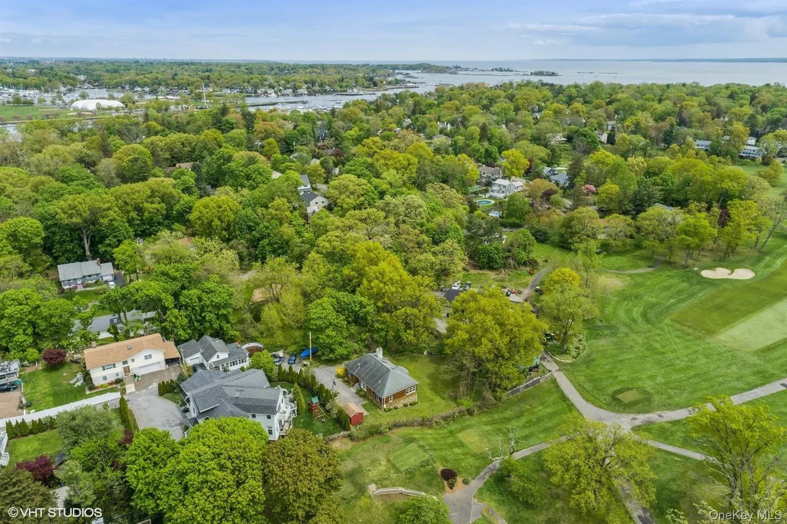 Birds eye view of property with a water view Birds eye view of property with a water view