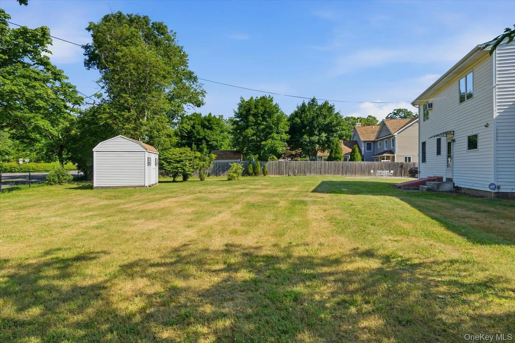 Large back yard with 3 sheds Large back yard with 3 sheds