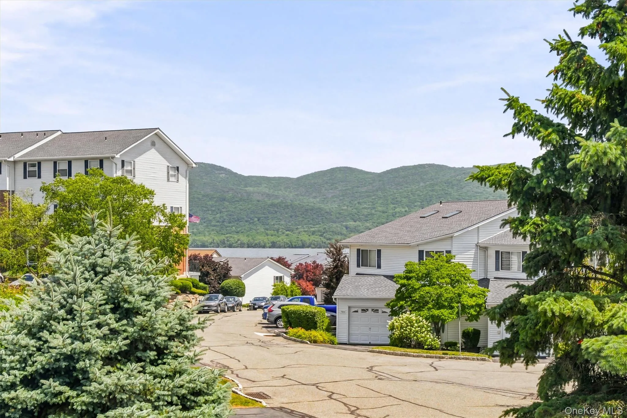 Enjoy scenic mountain views overlooking the Plum Point on Hudson community from this desirable location. Enjoy scenic mountain views overlooking the Plum Point on Hudson community from this desirable location.