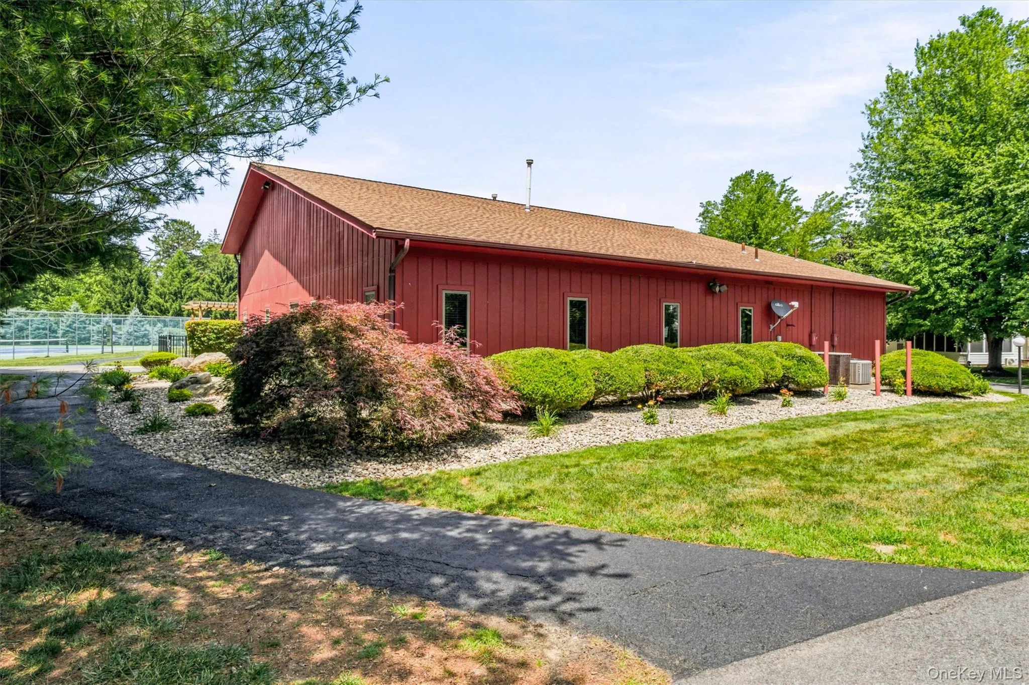 Community clubhouse surrounded by mature landscaping and conveniently located near the neighborhood tennis courts and recreational amenities. Community clubhouse surrounded by mature landscaping and conveniently located near the neighborhood tennis courts and recreational amenities.