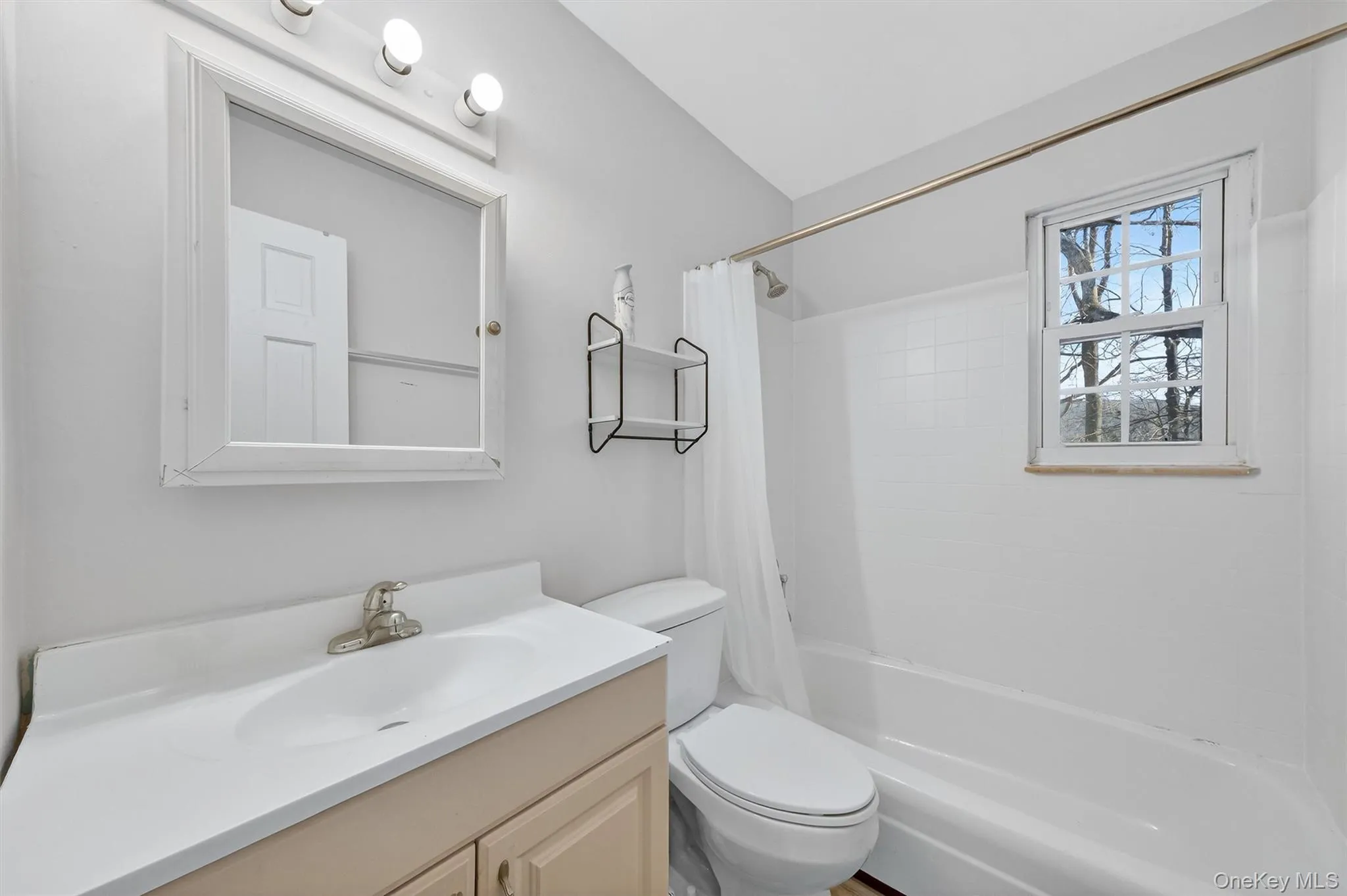 Full bath with shower / bath combination with curtain and vanity Full bath with shower / bath combination with curtain and vanity