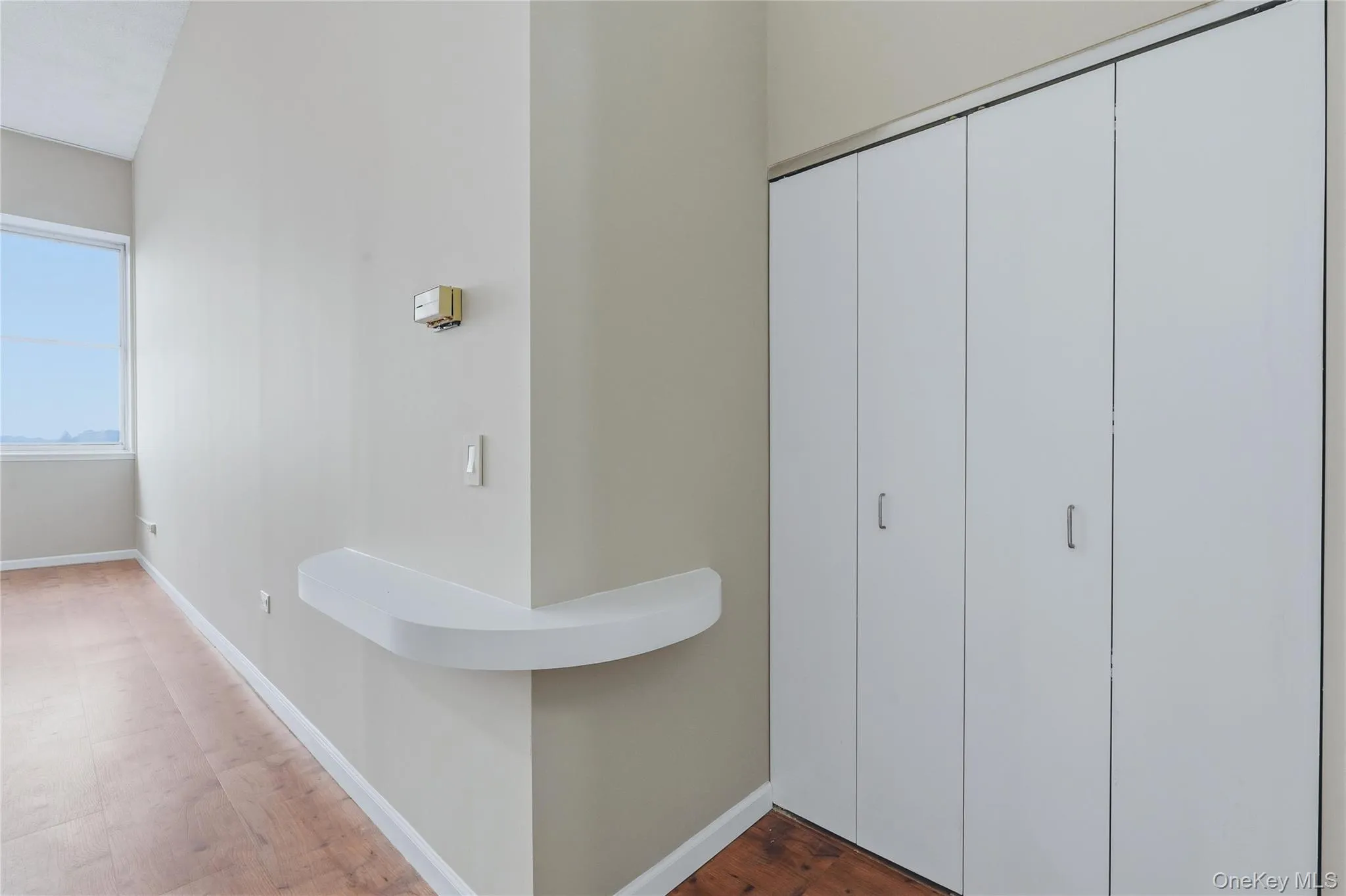 Entry with additional closet space and storage. Entry with additional closet space and storage.