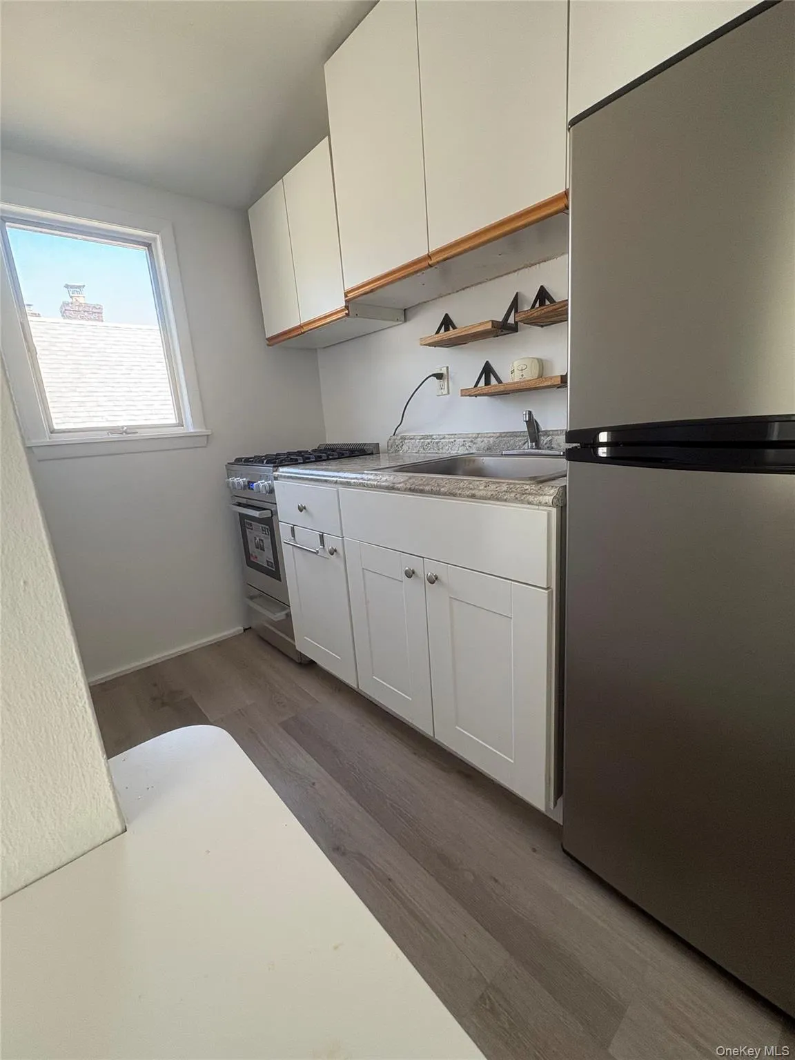 Kitchen with Brand New SS appliances Kitchen with Brand New SS appliances