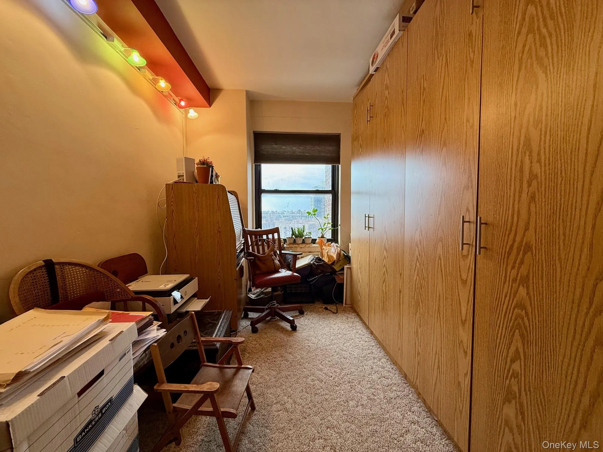 Second bedroom with built in closet, large window Second bedroom with built in closet, large window