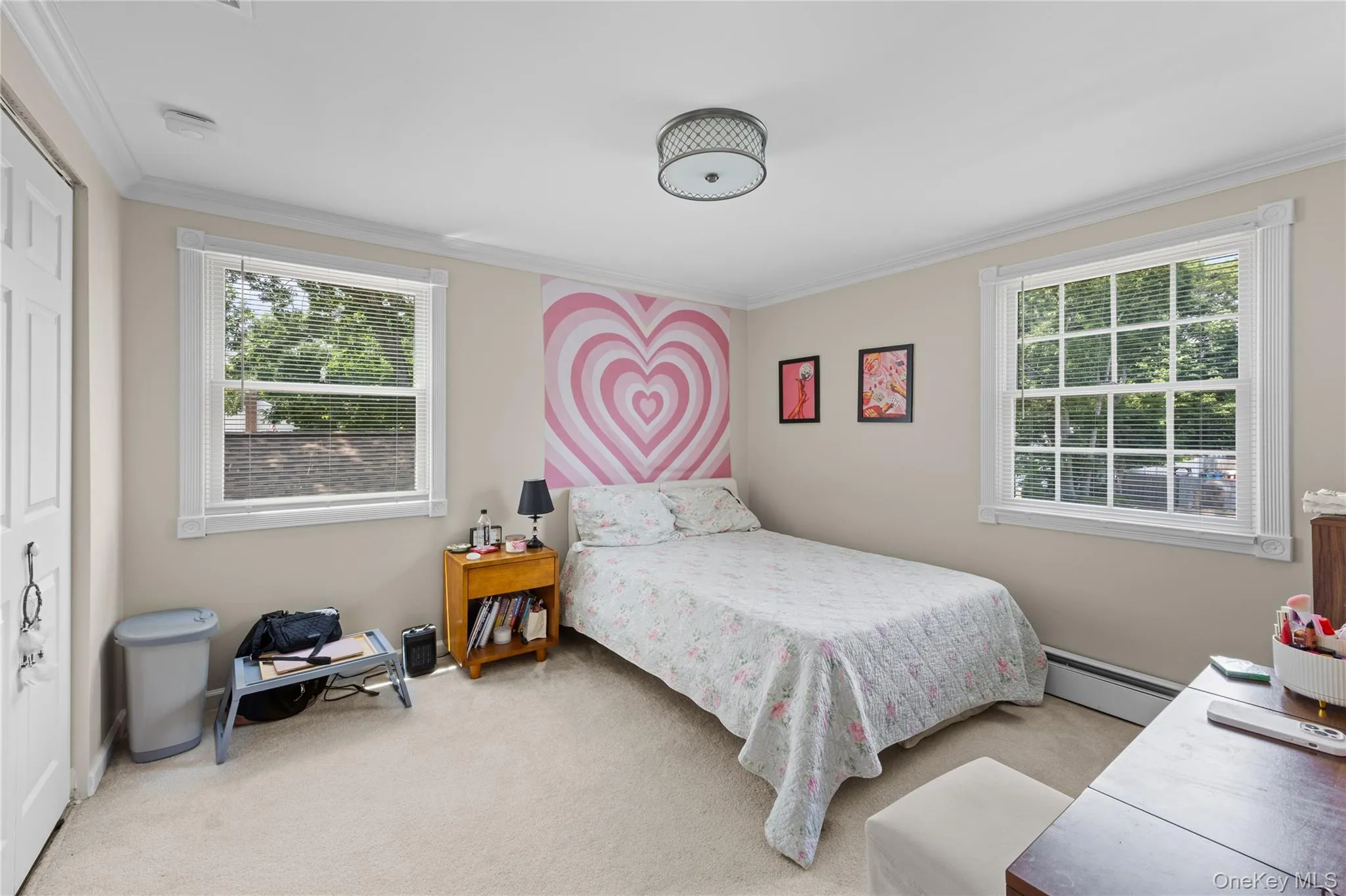 Neutral-toned walls complement the carpeted flooring Neutral-toned walls complement the carpeted flooring